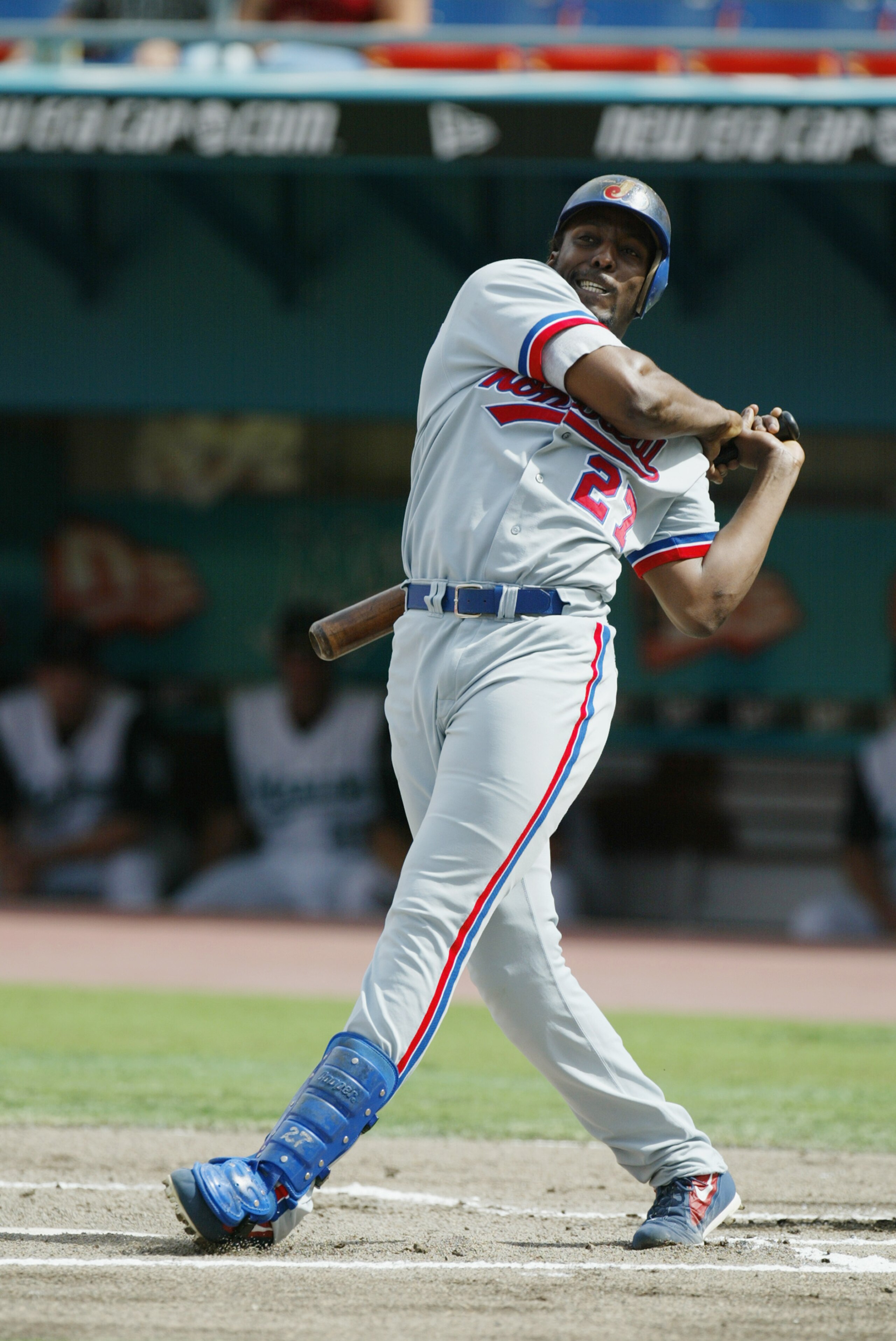 MIAMI - JULY 21:  Right fielder Vladimir Guerrero #27 of the Montreal Expos takes a mighty cut during the MLB game against the Florida Marlins on July 21, 2002 at Pro Player Stadium in Miami, Florida.  The Expos won 4-0.  (Photo By Eliot J. Schechter/Gett
