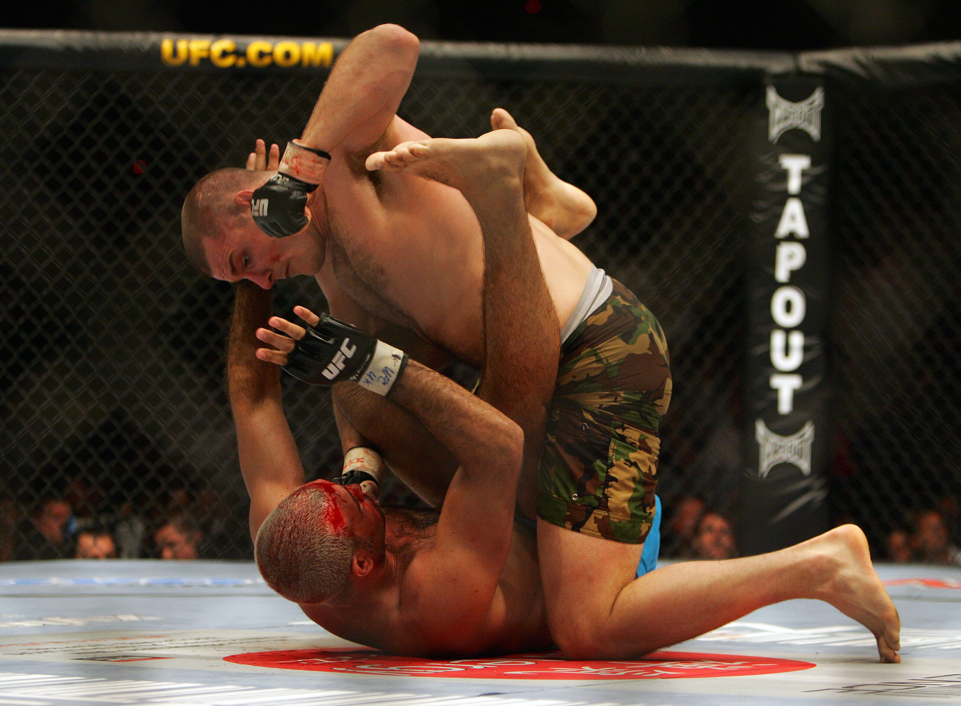 MANCHESTER, UNITED KINGDOM - APRIL 21:   Mike Bisping of England and Elvis Sinosic of Australia fight in action during a Light Heavyweight bout of the Ultimate Fighting Championship at the Manchester Evening News Arena on April 21, 2007 in Manchester, Eng