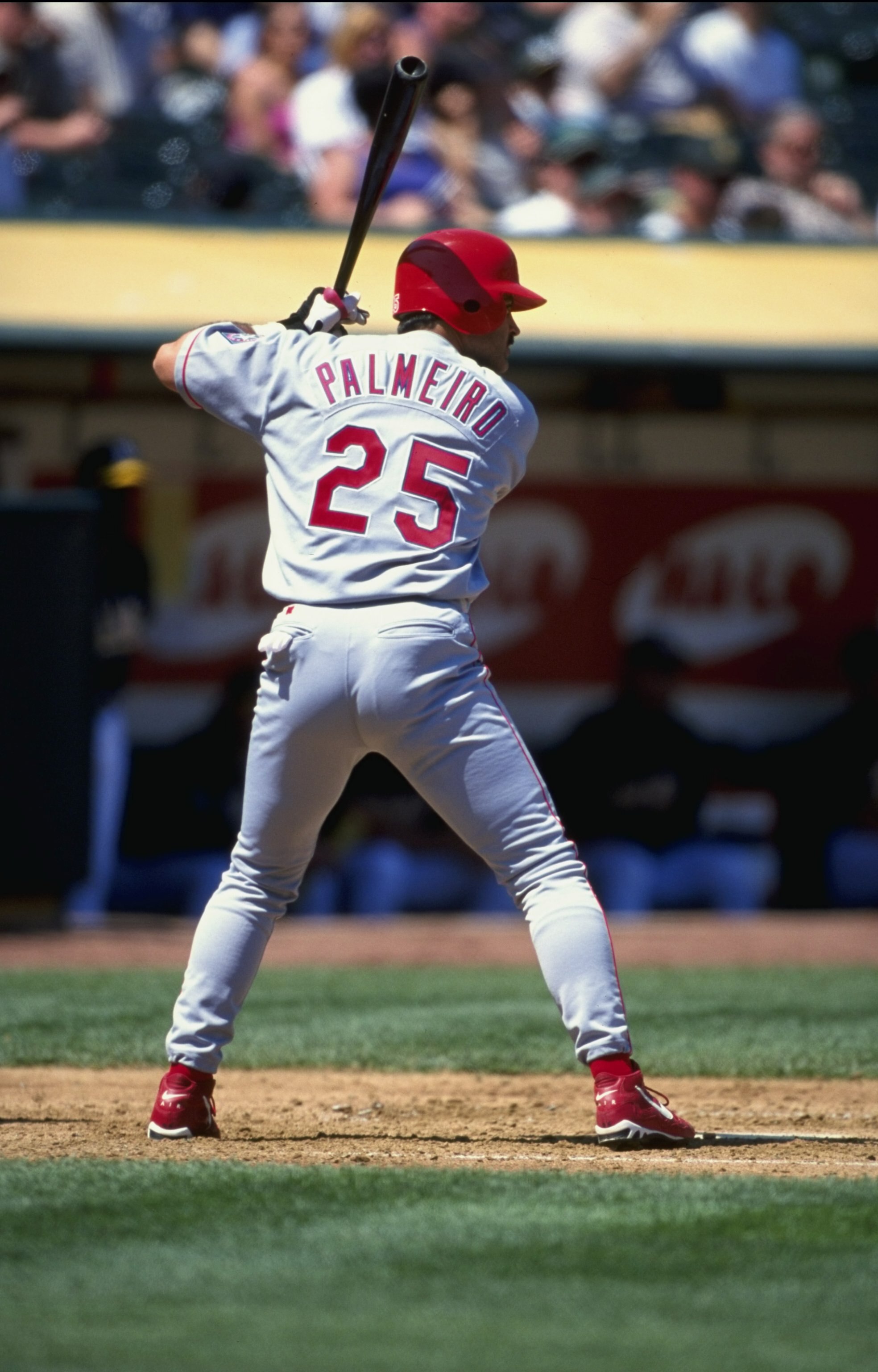 17 Apr 1999:  Rafael Palmeiro #25 of the Texas Rangers ready to hit the ball during the game against the Oakland Athletics at the Oakland Coliseum in Oakland, California. The Athletics defeated the Rangers 11-3. Mandatory Credit: Jed Jacobsohn  /Allsport