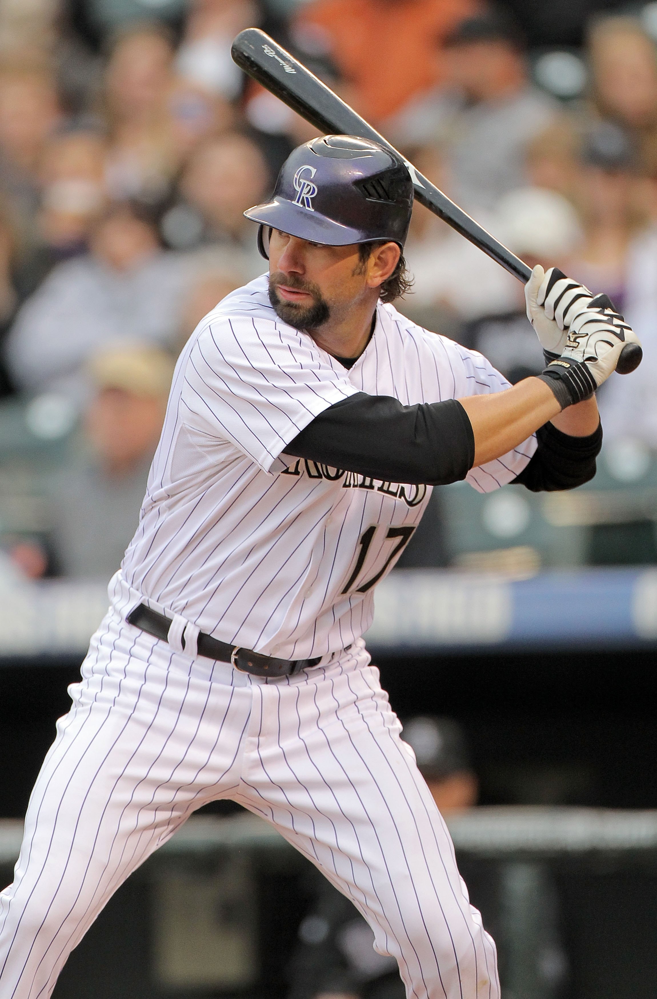 DENVER - APRIL 10:  First baseman Todd Helton #17 of the Colorado Rockies takes an at bat against the San Diego Padres during MLB action at Coors Field on April 10, 2010 in Denver, Colorado. The Padres defeated the Rockies 5-4 in 14 innings.  (Photo by Do