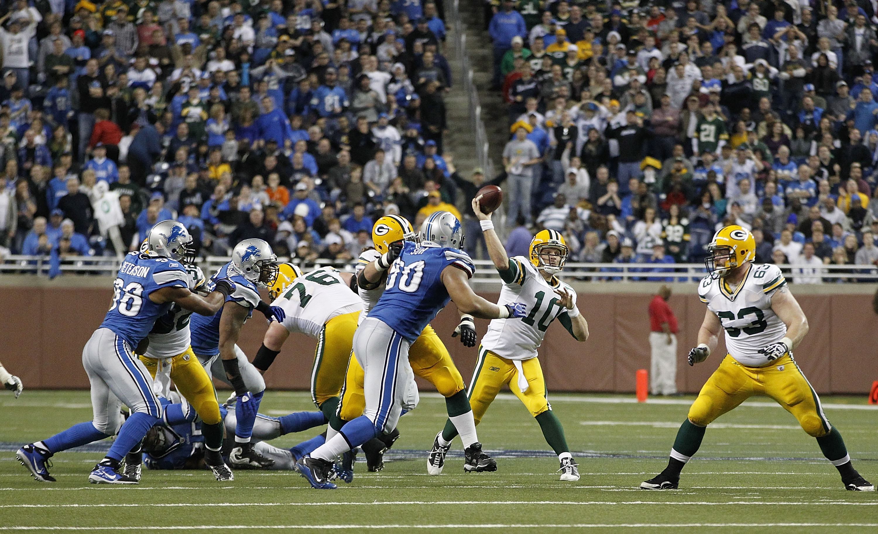 DETROIT - DECEMBER 12:  Matt Flynn #10 of the Green Bay Packers drops back to pass during the third quarter of the game against the Detroit Lions at Ford Field on December 12, 2010 in Detroit, Michigan. The Lions defeated the Packers 7-3.  (Photo by Leon 