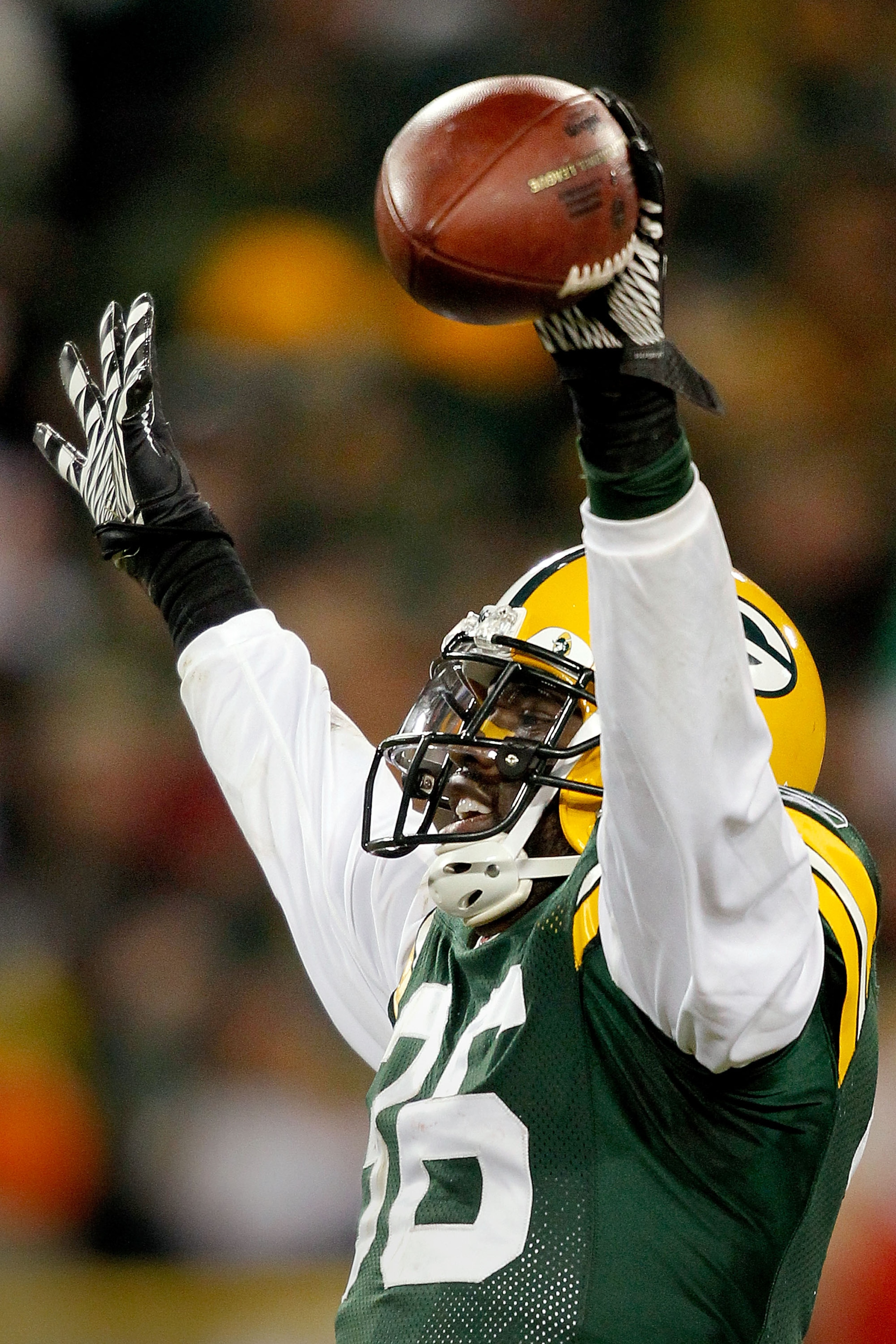 GREEN BAY, WI - JANUARY 02: Nick Collins #36 of the Green Bay Packers celebrates making a interception against the Chicago Bears to end their final drive in the fourth quarter at Lambeau Field on January 2, 2011 in Green Bay, Wisconsin.  (Photo by Matthew