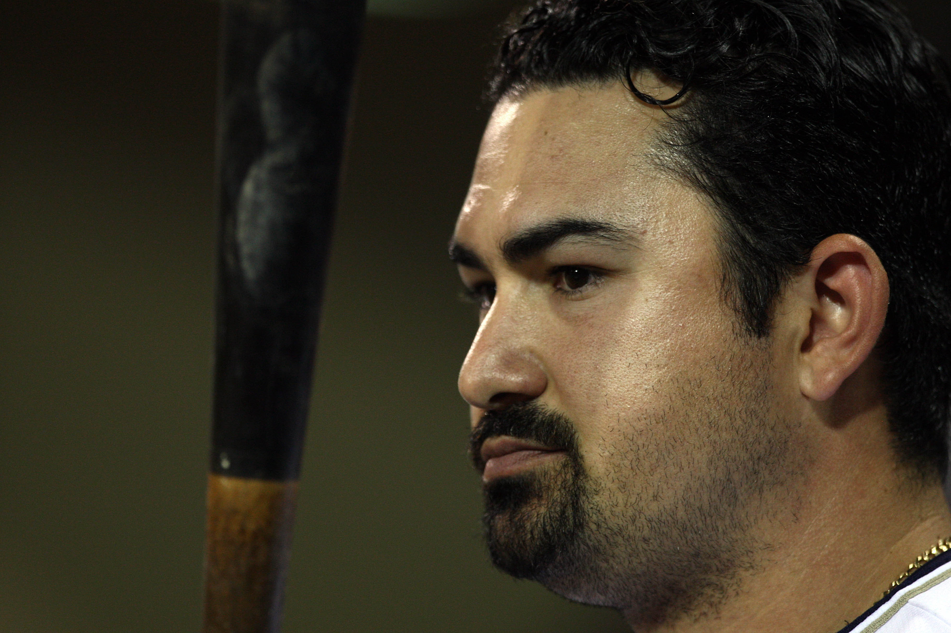 SAN DIEGO, CA - SEPTEMBER 10:  Adrian Gonzalez #23 of the San Diego Padres looks on against the San Francisco Giants during their MLB game on September 10, 2010 at Petco Park in San Diego, California. (Photo by Donald Miralle/Getty Images)