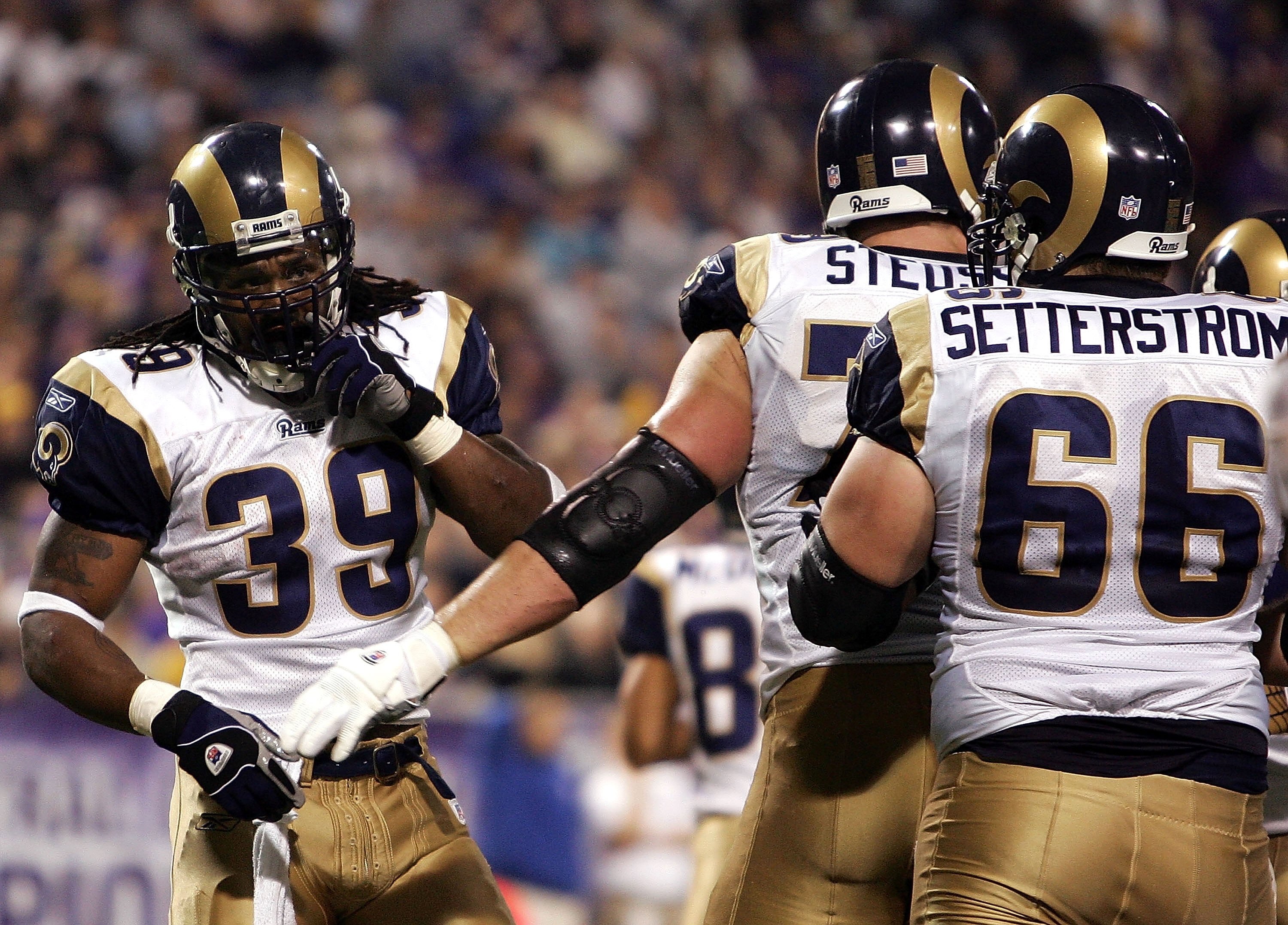 MINNEAPOLIS - DECEMBER 31:  Steven Jackson #39 of the St. Louis Rams celebrates his touchdown with teammates Todd Steussie #79 and Mark Setterstrom #66 in the first half against the Minnesota Vikings on December 31, 2006 at the Hubert H. Humphrey Metrodom