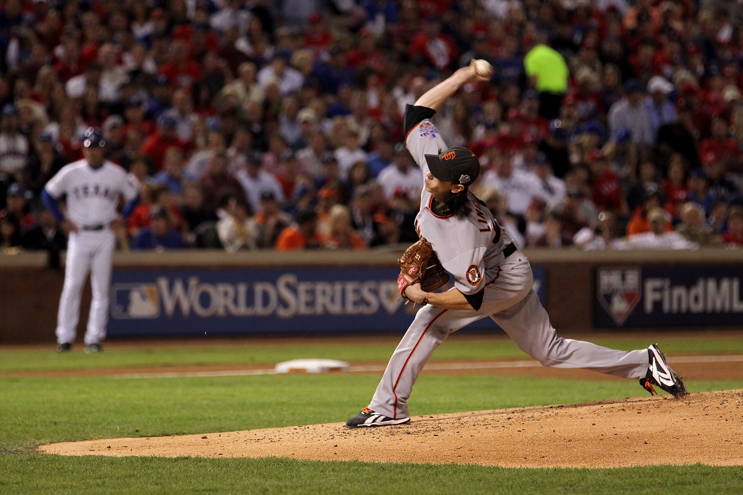 ARLINGTON, TX - NOVEMBER 01:  Starting pitcher Tim Lincecum #55 of the San Francisco Giants pitches against the Texas Rangers in Game Five of the 2010 MLB World Series at Rangers Ballpark in Arlington on November 1, 2010 in Arlington, Texas. The Giants wo