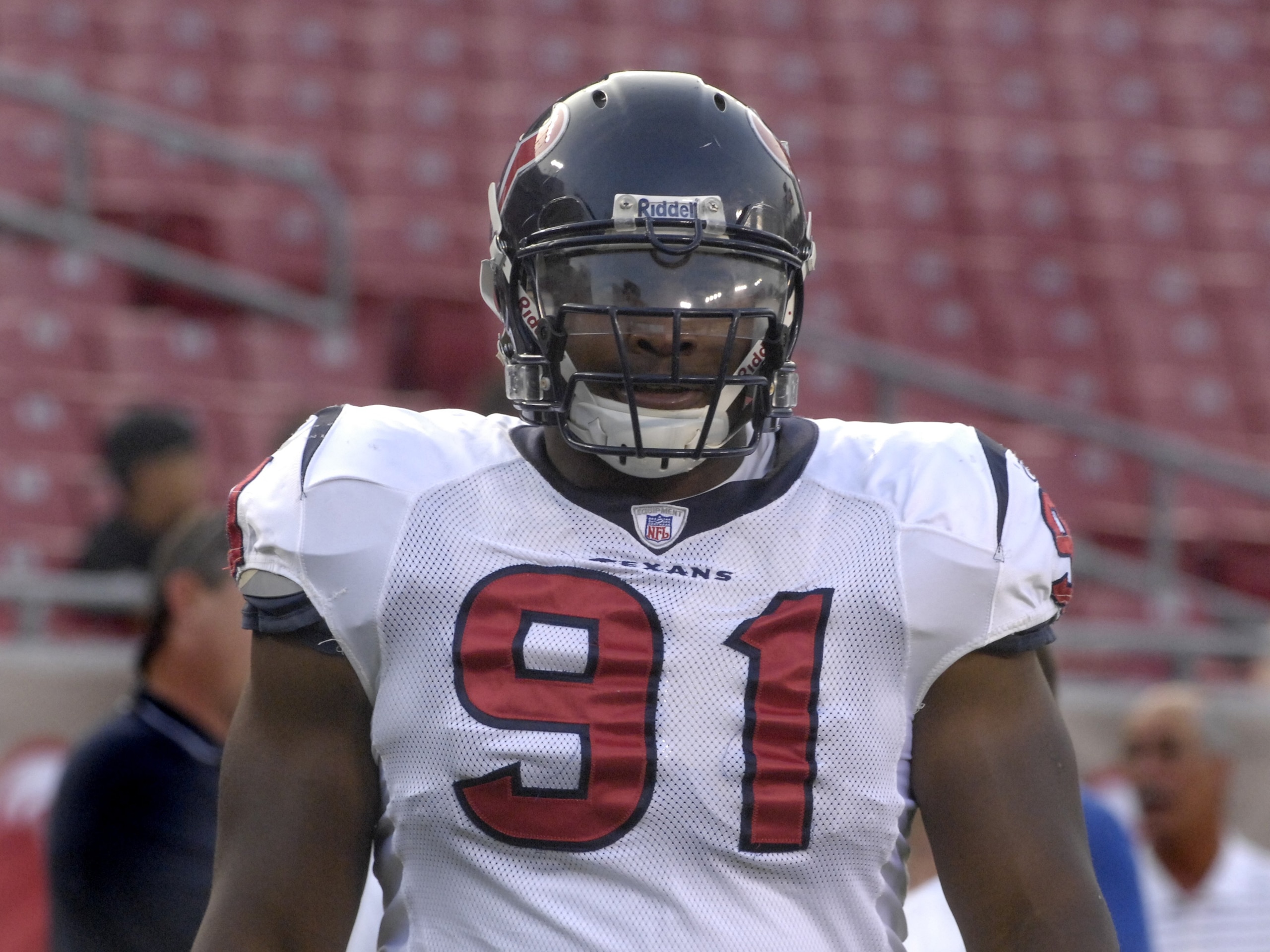 TAMPA, FL - AUGUST 30: Defensive tackle Amobi Okoye #91 of the Houston Texans warms up before play against the Tampa Bay Buccaneers during a pre-season game at Raymond James Stadium on August 30, 2007 in Tampa, Florida.  The Bucs won 31-24. (Photo by Al M