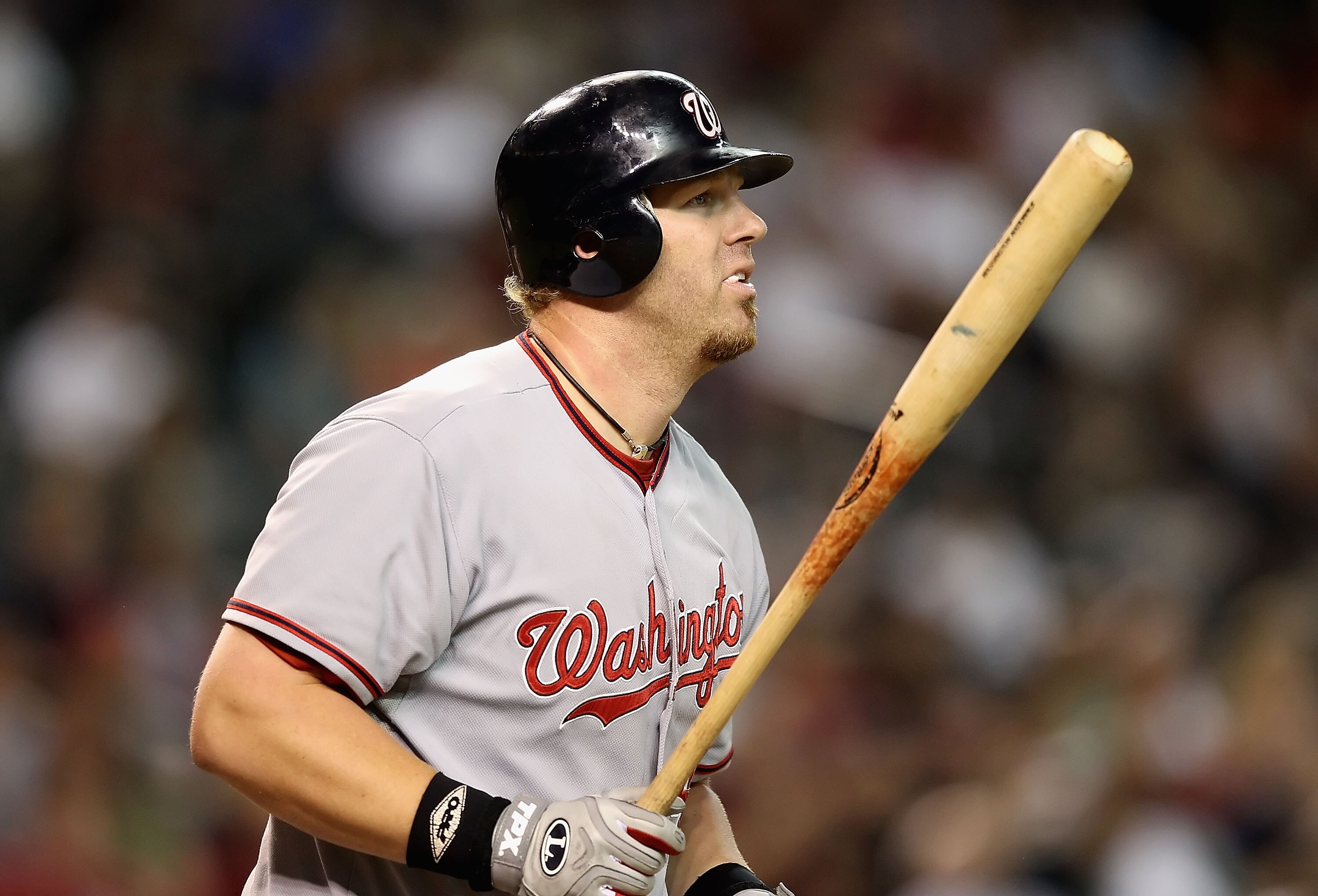 PHOENIX - AUGUST 04:  Adam Dunn #44 of the Washington Nationals hits a solo home run against the Arizona Diamondbacks during the fourth inning of the Major League Baseball game at Chase Field on August 4, 2010 in Phoenix, Arizona.  (Photo by Christian Pet