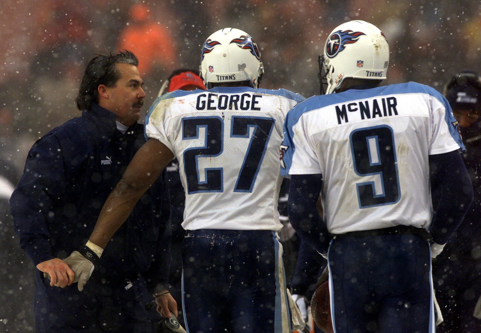 17 Dec 2000:  Head coach Jeff Fisher of the Tennessee Titans congratulates Quarterback Steve McNair #9  and Eddie George #27 after a touchdown during Sunday's game against the Cleveland Browns at Cleveland Browns Stadium in Cleveland, Ohio.  Digital Image