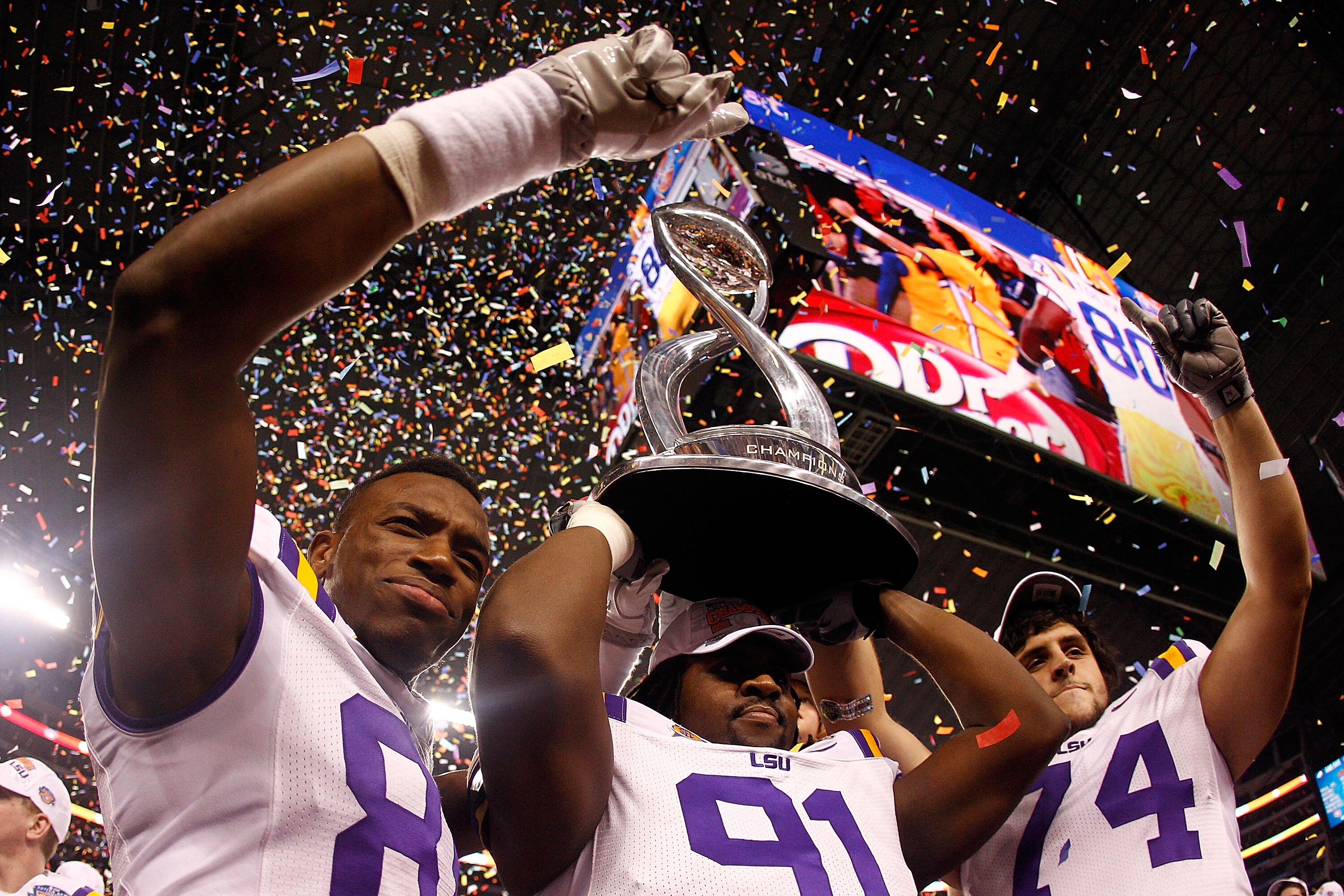 ARLINGTON, TX - JANUARY 07:  Members of the Louisiana State University Tigers celebrate after defeating the Texas A&M Aggies 41-24 during the AT&T Cotton Bowl at Cowboys Stadium on January 7, 2011 in Arlington, Texas.  (Photo by Chris Graythen/Getty Image