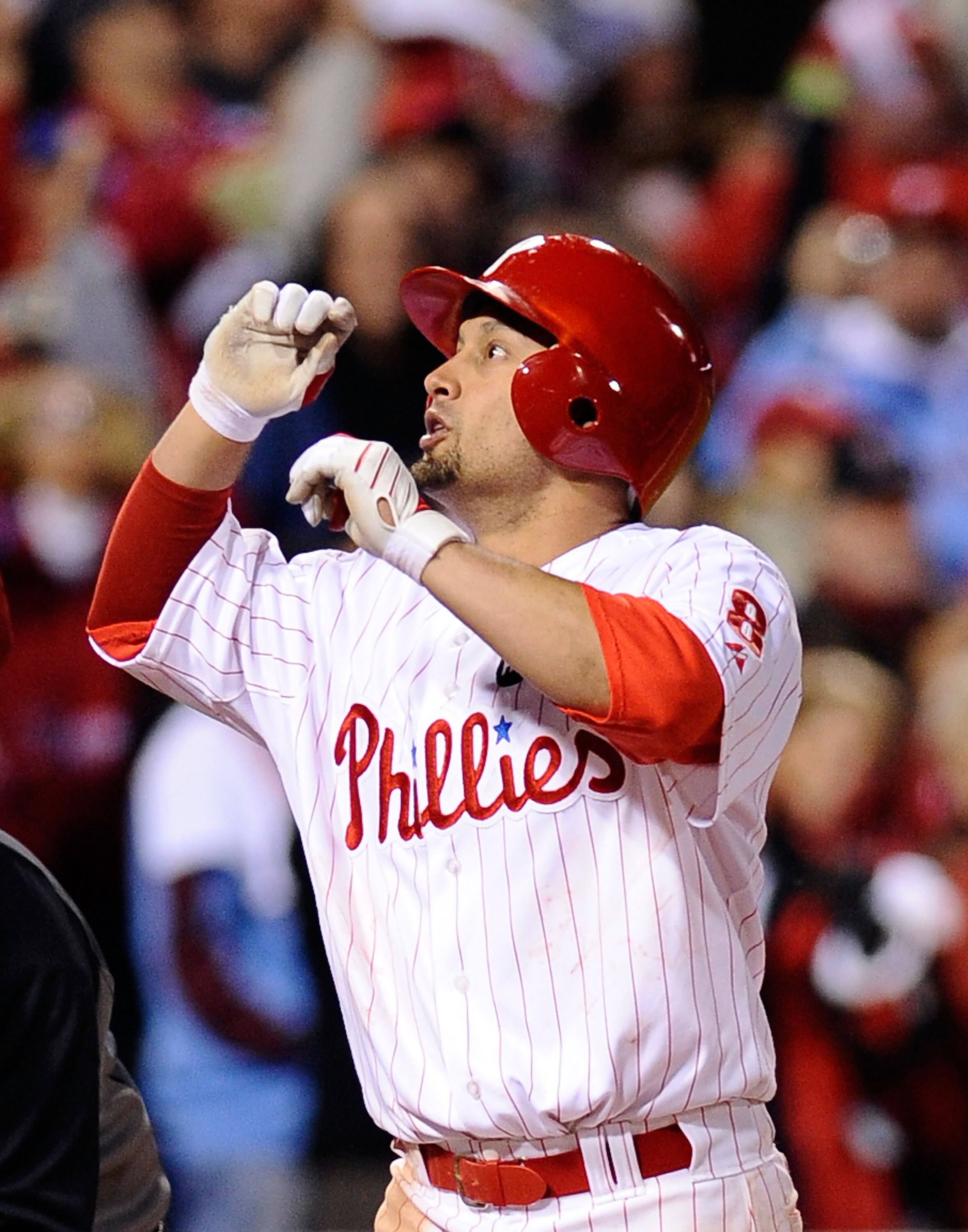 PHILADELPHIA - OCTOBER 18:  Shane Victorino #8 of the Philadelphia Phillies celebrates his three-run home run against the Los Angeles Dodgers in Game Three of the NLCS during the 2009 MLB Playoffs at Citizens Bank Park on October 18, 2009 in Philadelphia,