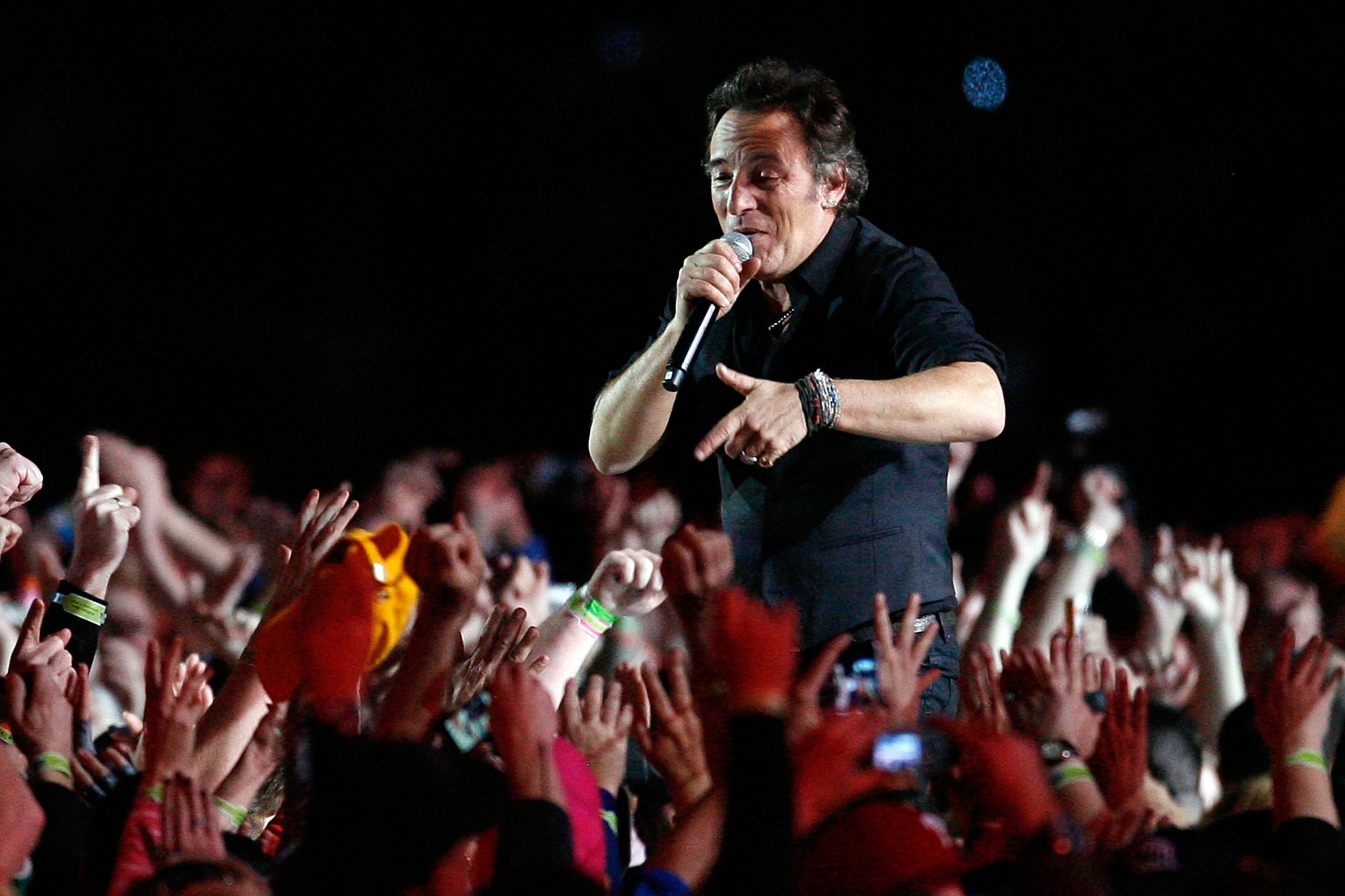 TAMPA, FL - FEBRUARY 01:  Musician Bruce Springsteen and the E Street Band  perform at the Bridgestone halftime show during Super Bowl XLIII between the Arizona Cardinals and the Pittsburgh Steelers on February 1, 2009 at Raymond James Stadium in Tampa, F