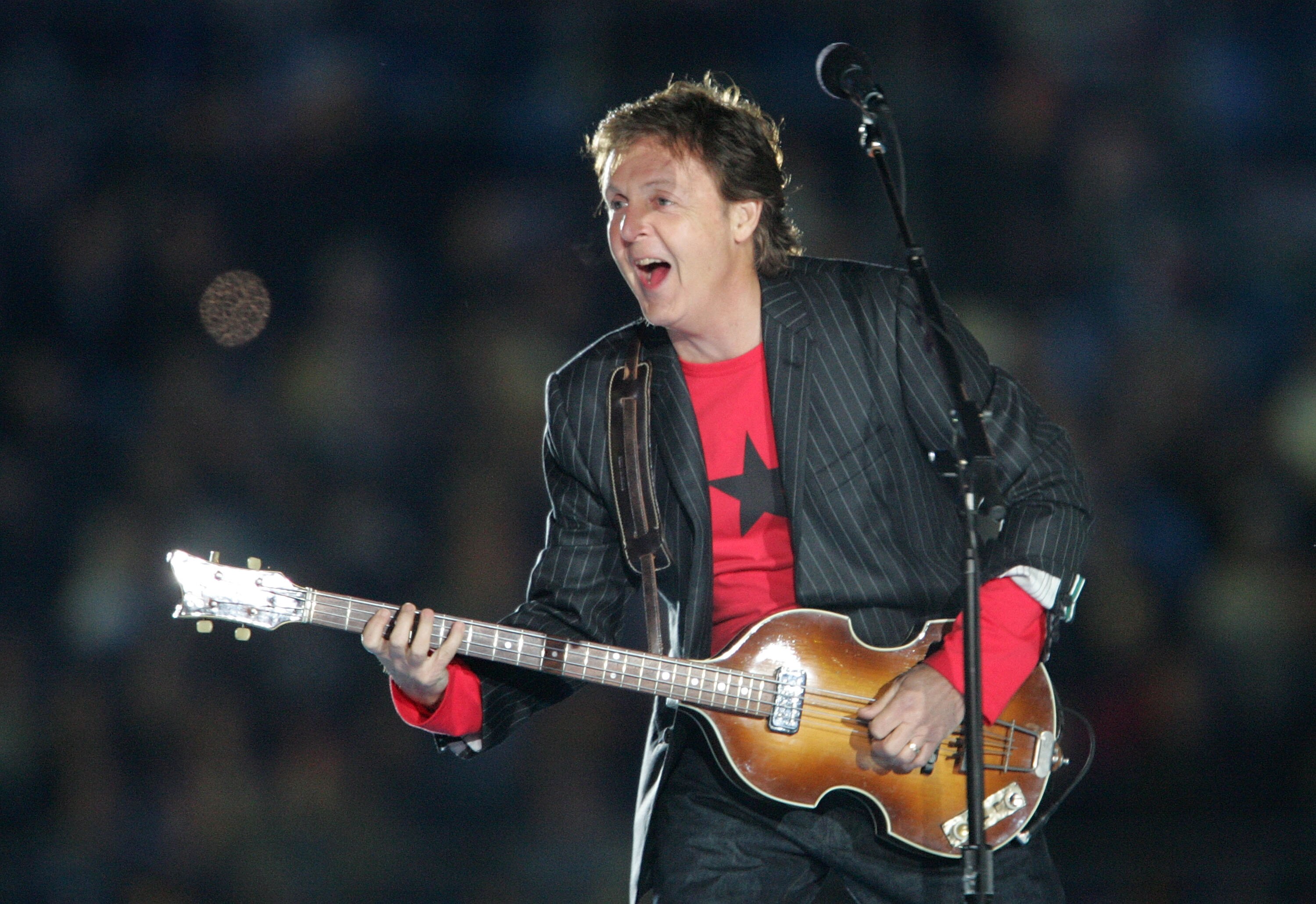 JACKSONVILLE, FL - FEBRUARY 06:  Singer Paul McCartney performs during the Super Bowl XXXIX halftime show at Alltel Stadium on February 6, 2005 in Jacksonville, Florida.  (Photo by Jeff Gross/Getty Images)