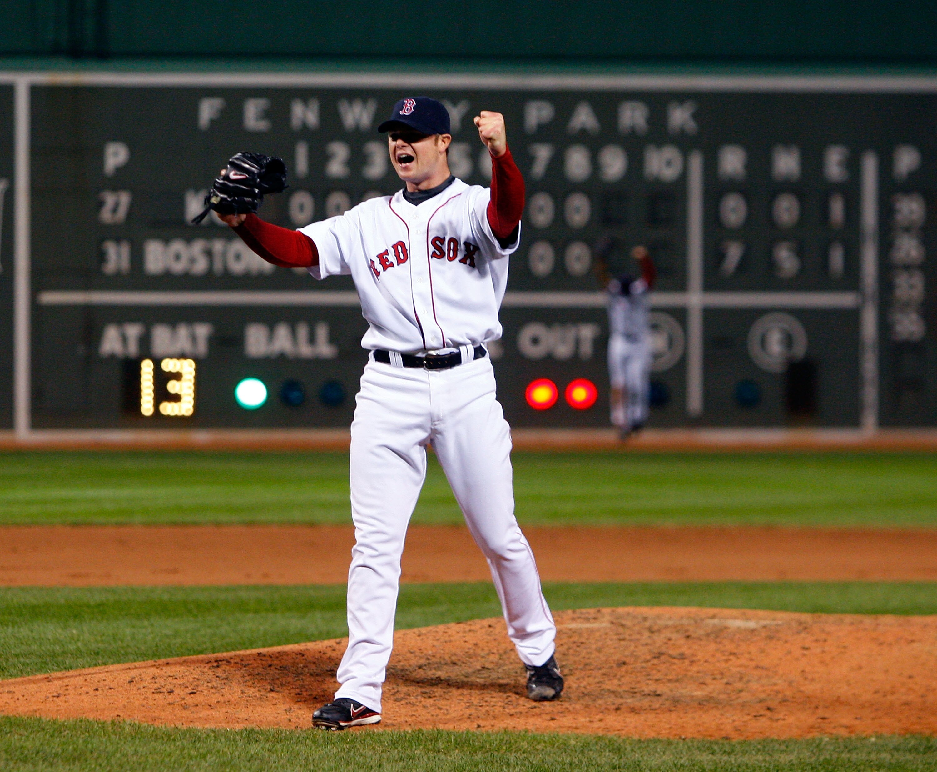 BOSTON - MAY 19:  Jon Lester #31 of the Boston Red Sox reacts after throwing a no hitter against the Kansas City Royals at Fenway Park on May 19, 2008 in Boston, Massachusetts.  (Photo by Jim Rogash/Getty Images)