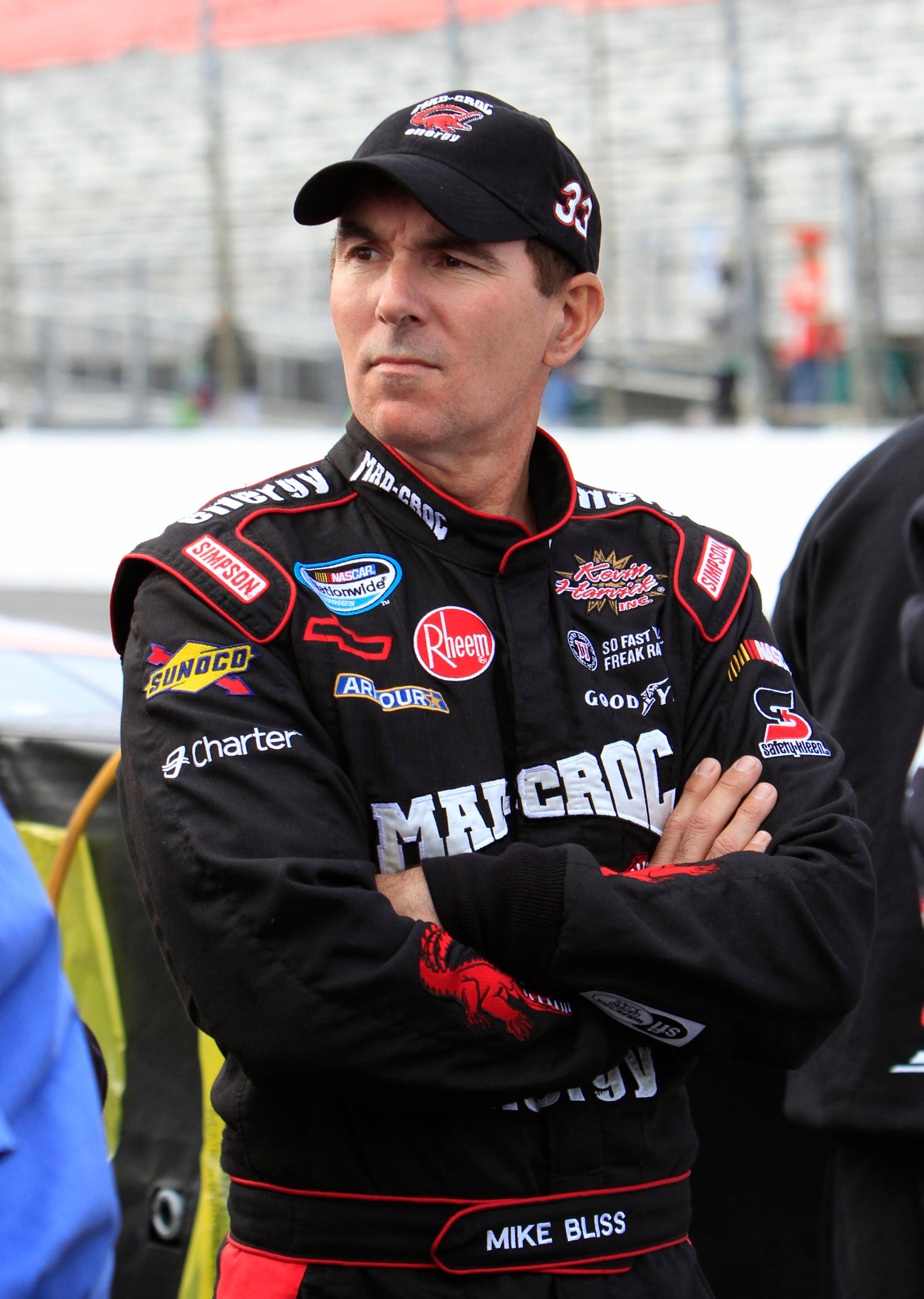 MADISON, IL - OCTOBER 23: Mike Bliss, driver of the #33 Mad Croc Energy Chevrolet stands on the grid as he waits for his qualifying run for the NASCAR 5-hour Energy 250 at Gateway International Raceway on October 23, 2010 in Madison, Illinois.  (Photo by