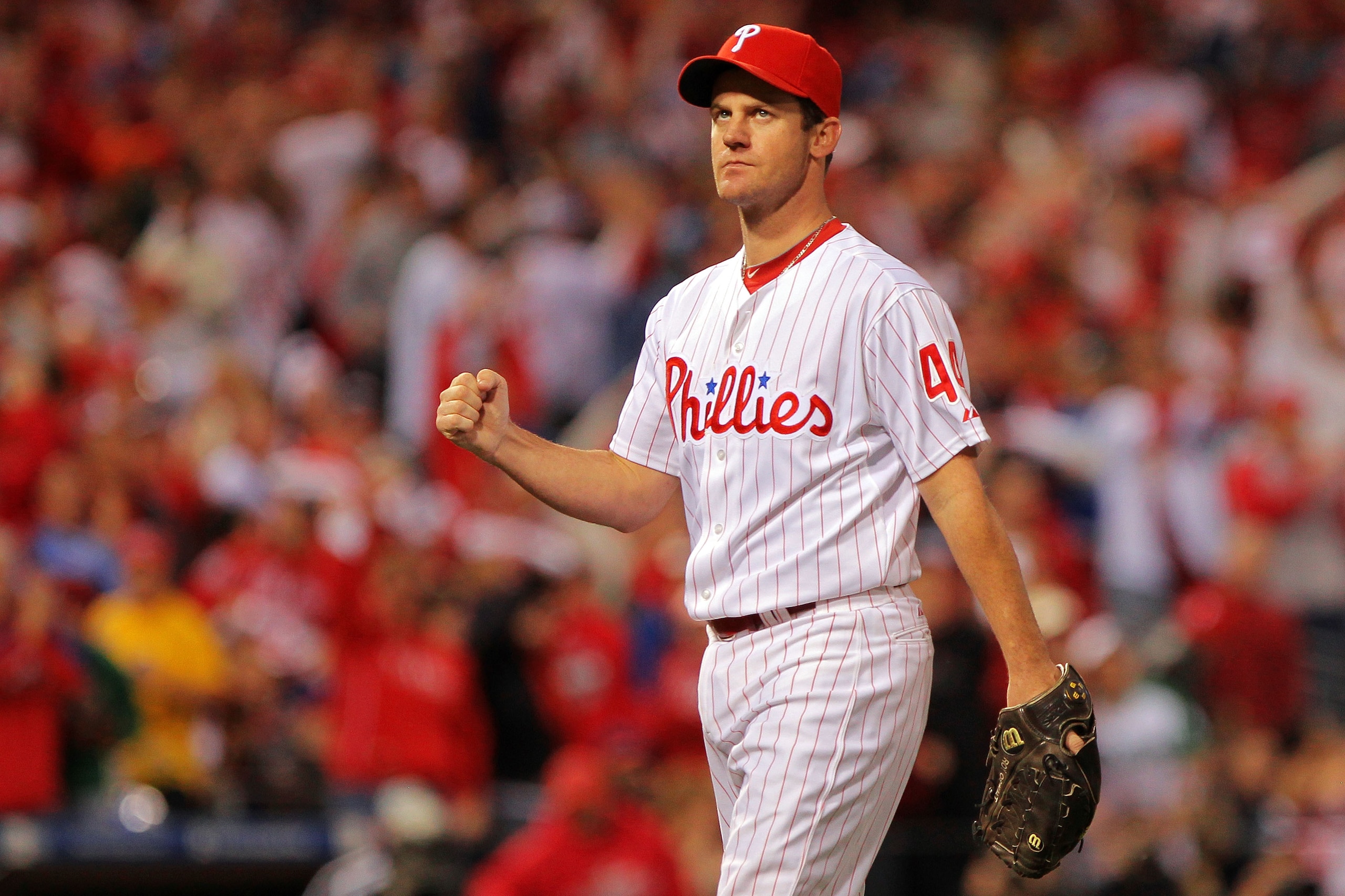 PHILADELPHIA - OCTOBER 23:  Roy Oswalt #44 of the Philadelphia Phillies celebrates after ending the sixth inning against the San Francisco Giants in Game Six of the NLCS during the 2010 MLB Playoffs at Citizens Bank Park on October 23, 2010 in Philadelphi
