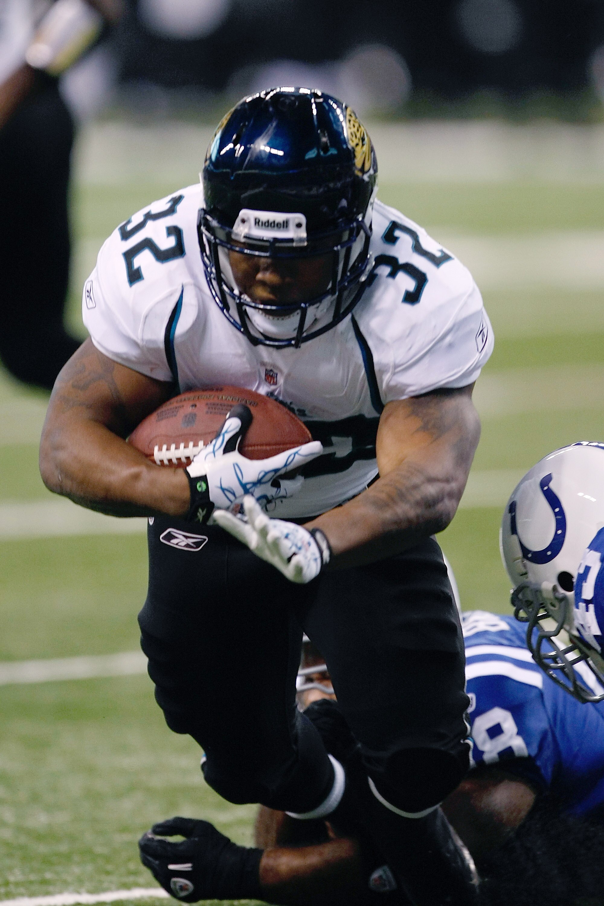 INDIANAPOLIS, IN - DECEMBER 19: Maurice Jones-Drew #32 of the Jacksonville Jaguars dives against the Indianapolis Colts at Lucas Oil Stadium on December 19, 2010 in Indianapolis, Indiana. The Colts defeated the Jaguars 34-24. (Photo by Scott Boehm/Getty I