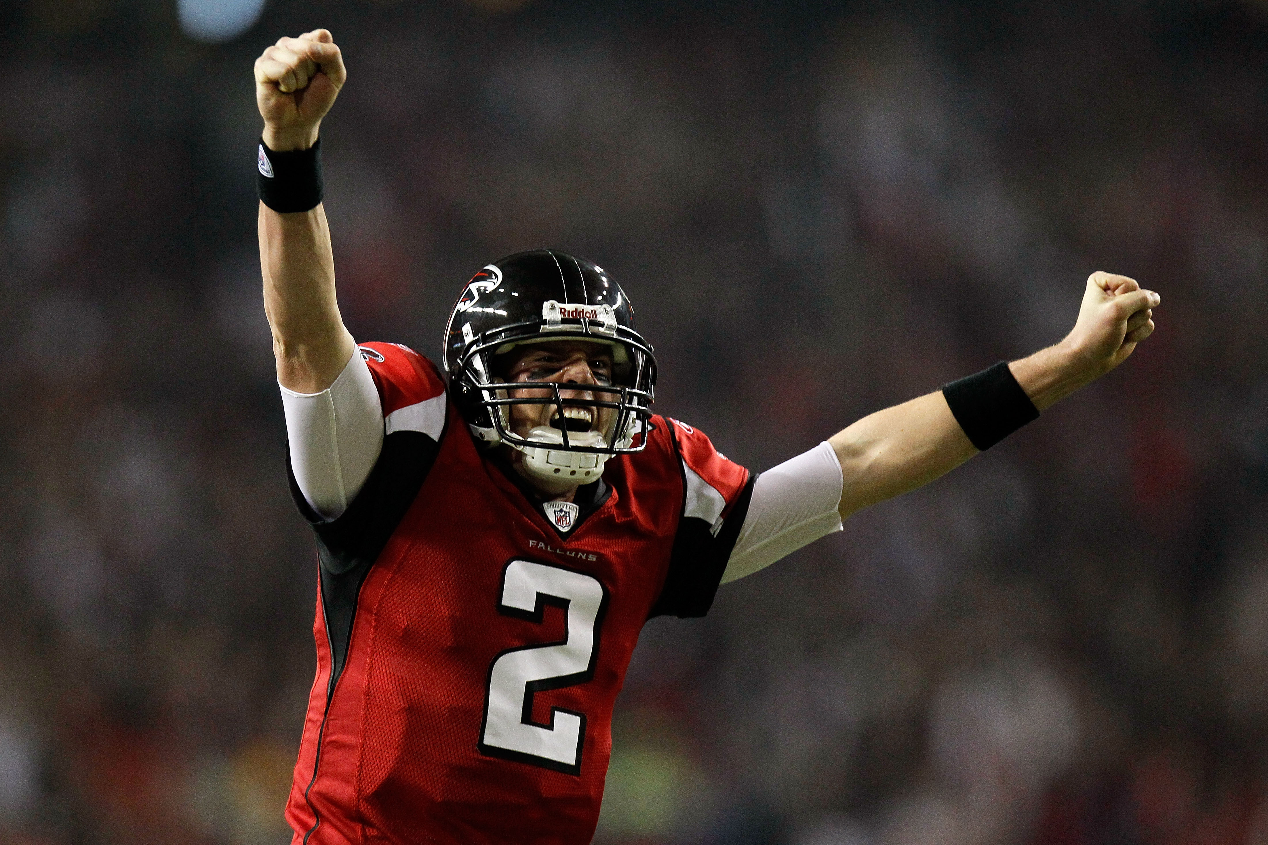 ATLANTA, GA - JANUARY 15:  Matt Ryan #2 of the Atlanta Falcons reacts after Michael Turner #33 scored a 12-yard rushing touchdown in the first quarter against the Green Bay Packers during their 2011 NFC divisional playoff game at Georgia Dome on January 1