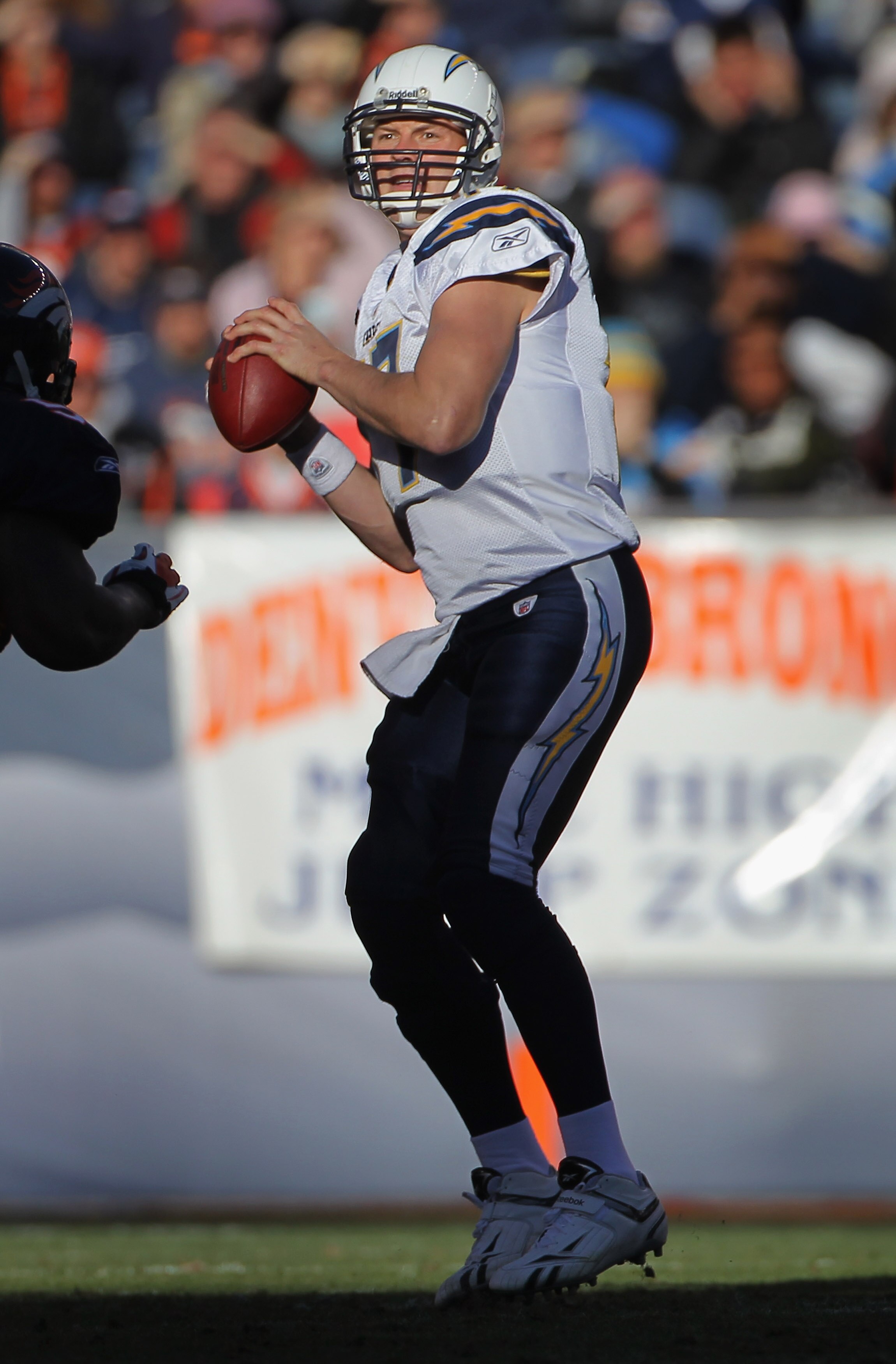 DENVER - JANUARY 02:  Quarterback Philip Rivers #17 of the San Diego Chargers looks to deliver a pass against the Denver Broncos at INVESCO Field at Mile High on January 2, 2011 in Denver, Colorado. The Chargers defeated the Broncos 33-28.  (Photo by Doug