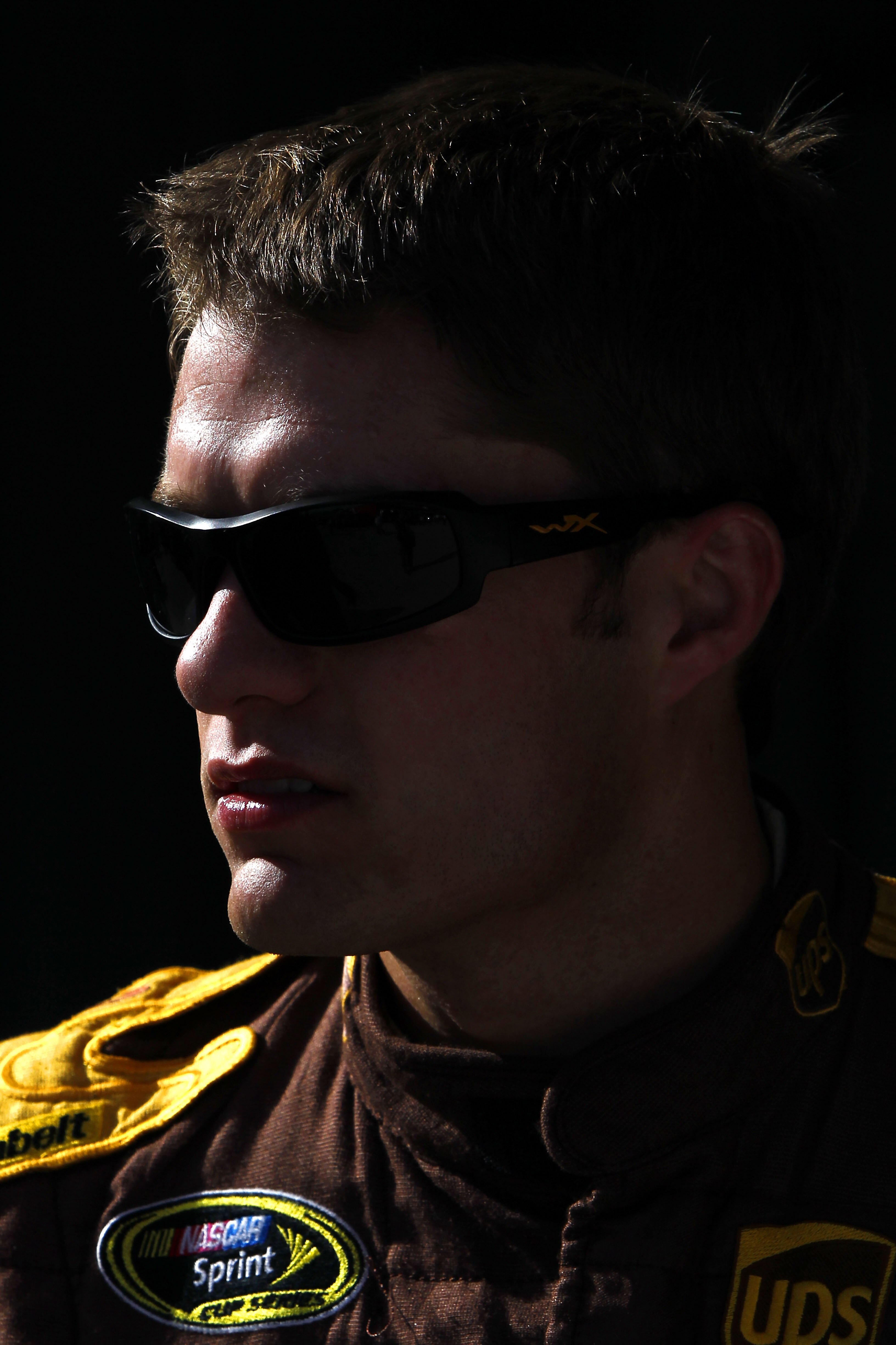 HOMESTEAD, FL - NOVEMBER 20:  David Ragan, driver of the #6 UPS Ford, walks in the garage area during practice for the NASCAR Sprint Cup Series Ford 400 at Homestead-Miami Speedway on November 20, 2010 in Homestead, Florida.  (Photo by Chris Trotman/Getty