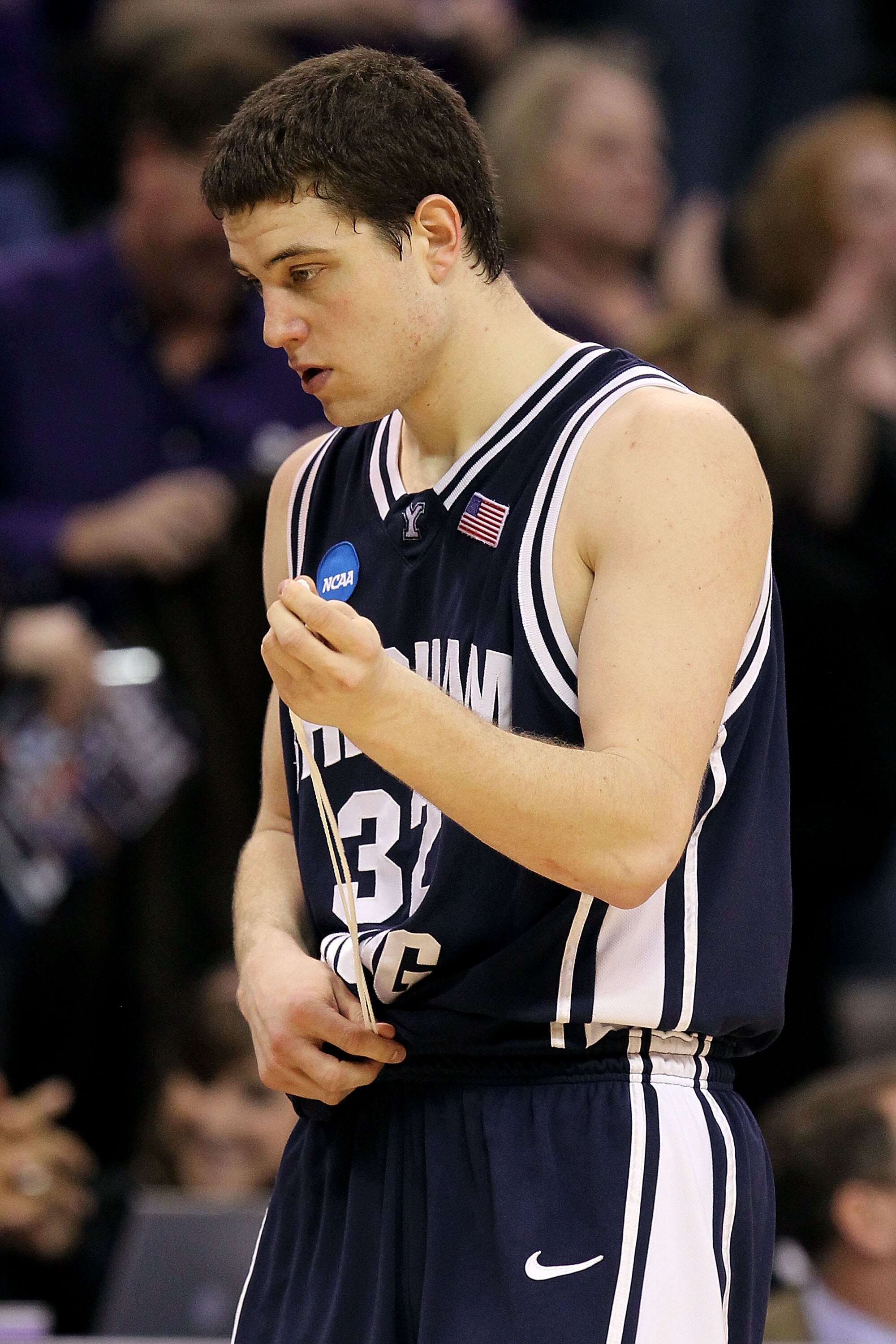 OKLAHOMA CITY - MARCH 20:  Jimmer Fredette #32 of the Brigham Young Cougars walks off the court dejected against the Kansas State Wildcats during the second round of the 2010 NCAA men's basketball tournament at Ford Center on March 20, 2010 in Oklahoma Ci