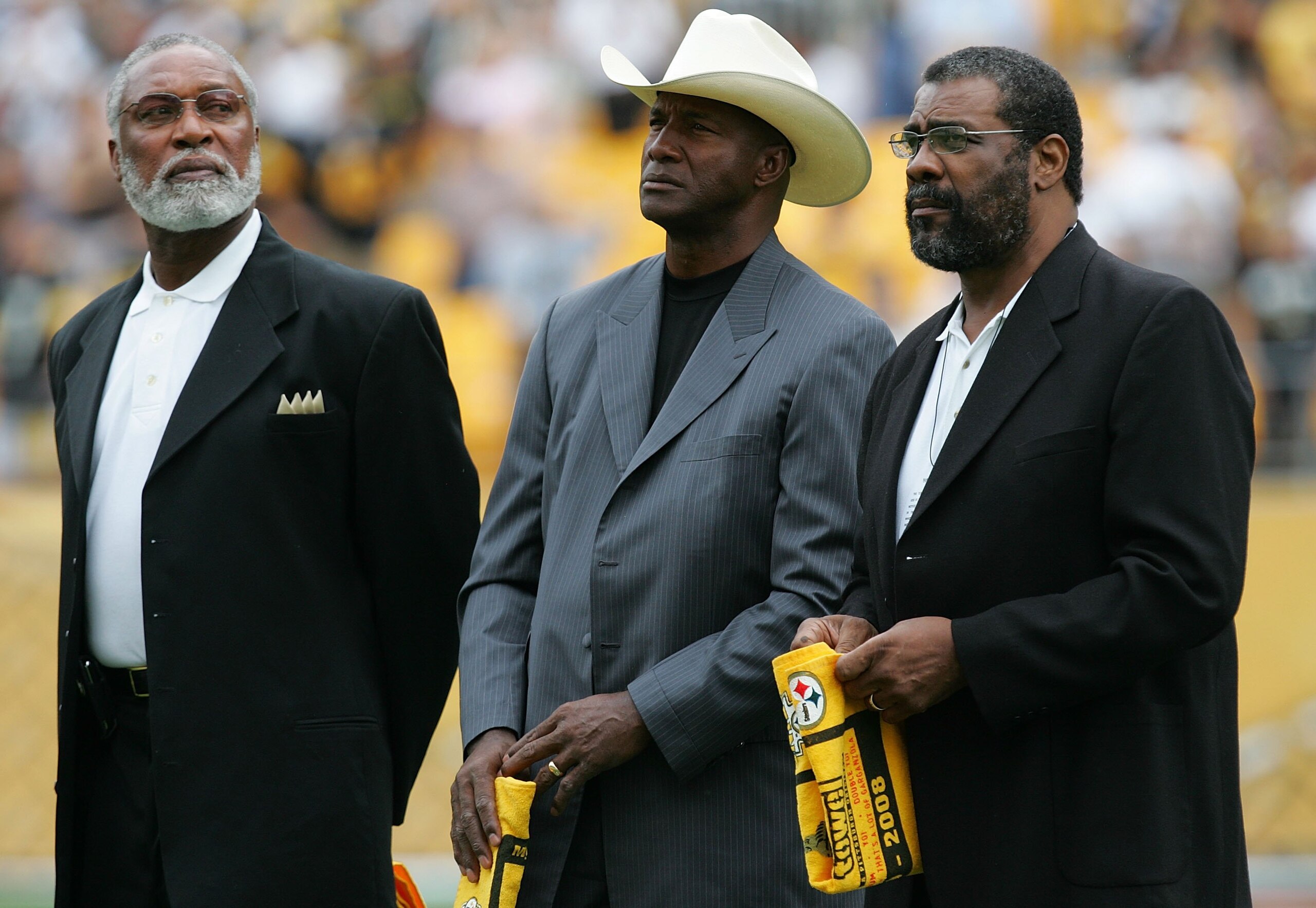 PITTSBURGH - SEPTEMBER 07:  Former members of the Pittsburgh Steelers, L.C. Greenwood (L), Mel Blount, and 'Mean' Joe Greene (R) before a game against the Houston Texans on September 7, 2008 at Heinz Field in Pittsburgh, Pennsylvania.  (Photo by Ronald Ma