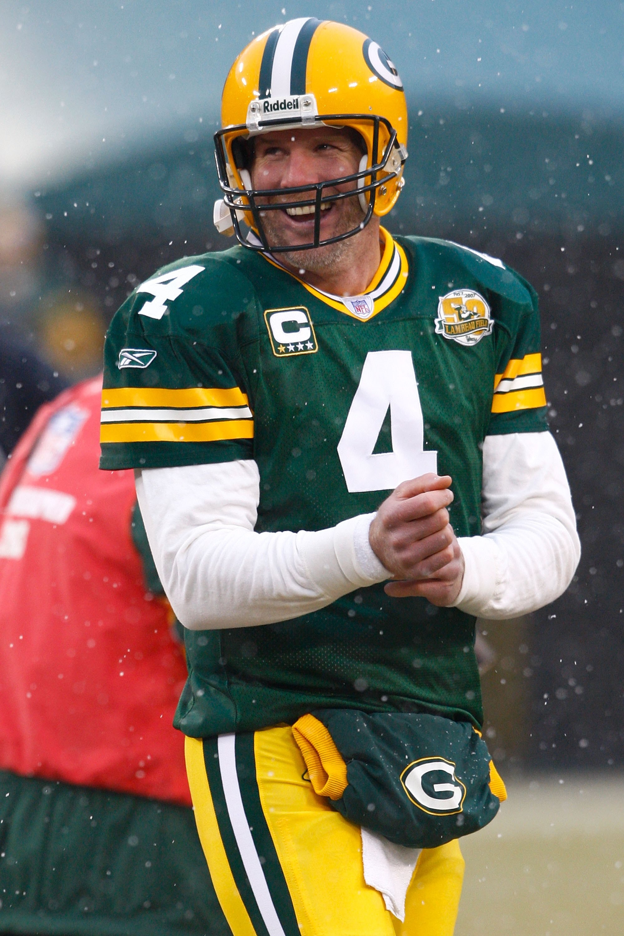 GREEN BAY, WI - JANUARY 12:  Quarterback Brett Favre #4 of the Green Bay Packers looks on against the Seattle Seahawks during the NFC divisional playoff game on January 12, 2008 at Lambeau Field in Green Bay, Wisconsin. The Packers defeated the Seahawks 4