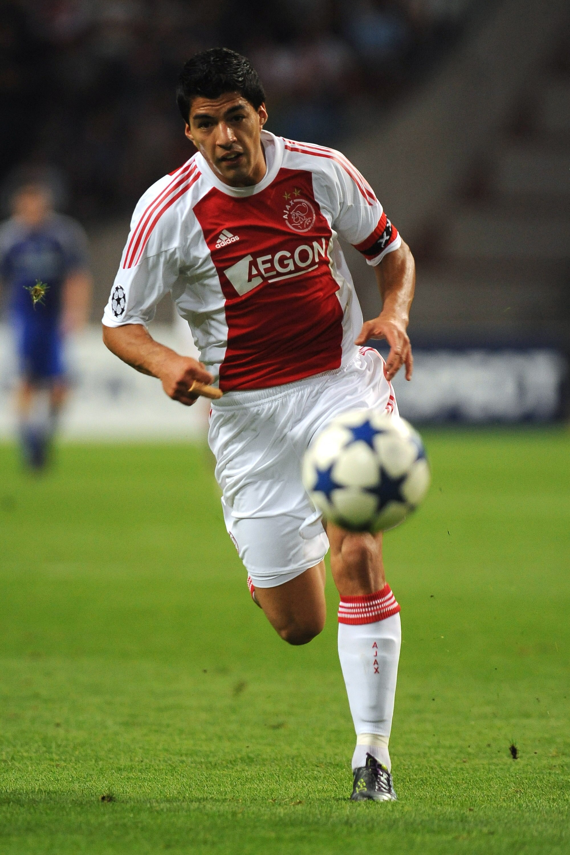 AMSTERDAM, NETHERLANDS - AUGUST 25:  Luis Suarez of AFC Ajax in action during the Champions League Play-off match between AFC Ajax and FC Dynamo Kiev at Amsterdam Arena on August 25, 2010 in Amsterdam, Netherlands.  (Photo by Valerio Pennicino/Getty Image