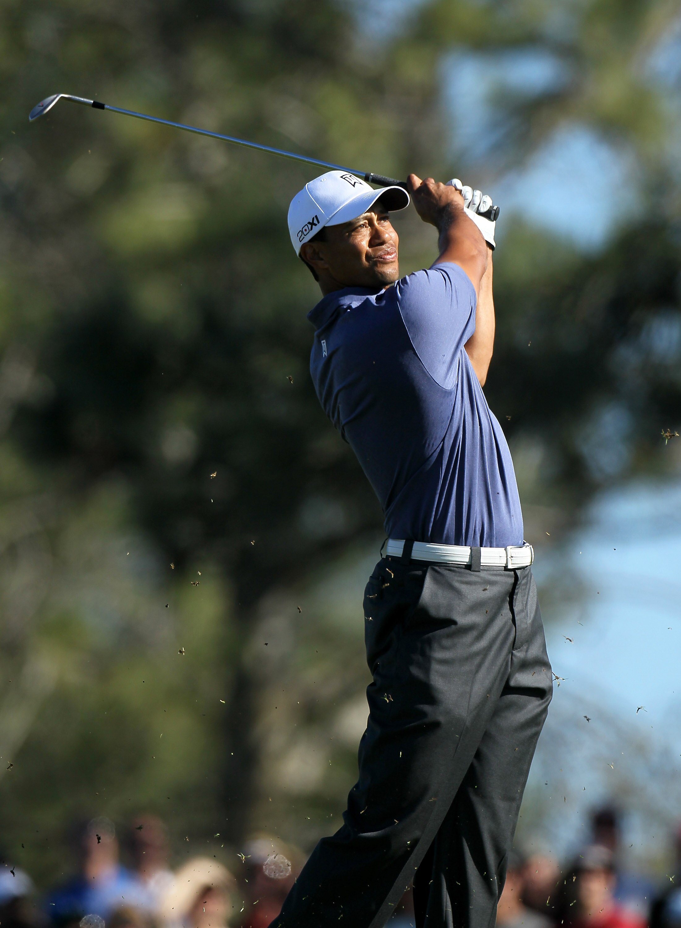 LA JOLLA, CA - JANUARY 28: Tiger Woods hits his second shot on the second hole during round two of the Farmers Insurance Open at Torrey Pines South Course on January 28, 2011 in La Jolla, California. (Photo by Stephen Dunn/Getty Images)