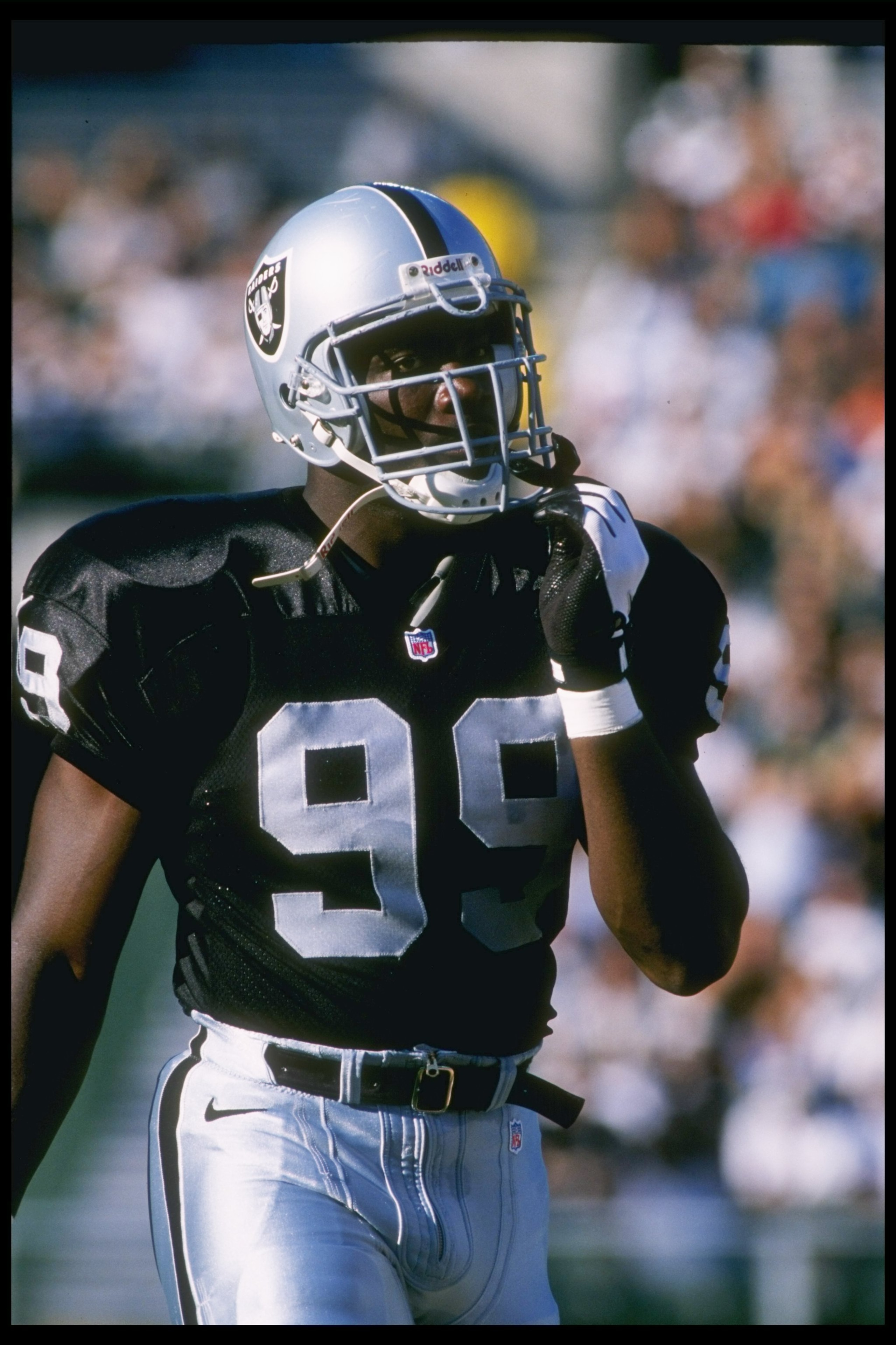 8 Aug 1996:  Defensive lineman Aundray Bruce of the Oakland Raiders looks on during a preseason game against the Seattle Seahawks at the Oakland-Alameda County Coliseum in Oakland, California.  The Seahawks won the game, 24-19. Mandatory Credit: Otto Greu
