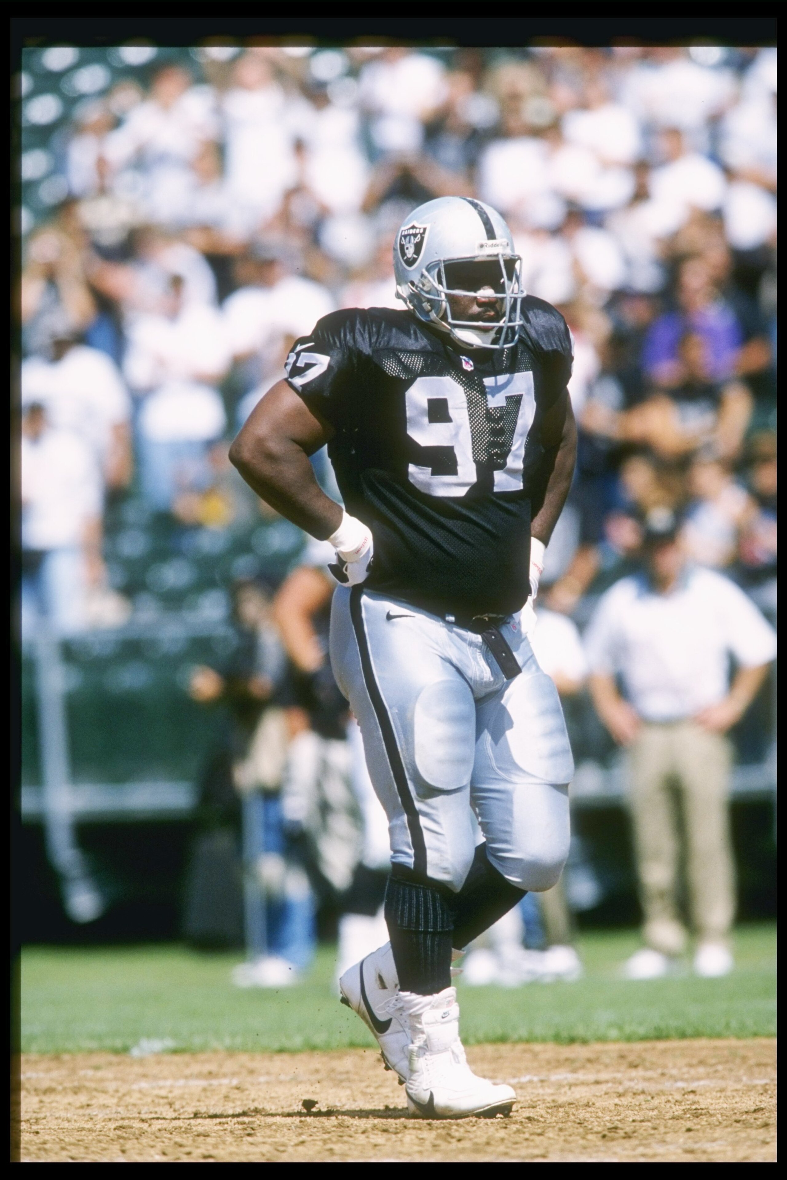 15 Sep 1996:  Defensive lineman Russell Maryland of the Oakland Raiders looks on during a game against the Jacksonville Jaguars at the Oakland-Alameda County Coliseum in Oakland, California.  The Raiders won the game, 17-3. Mandatory Credit: Stephen Dunn