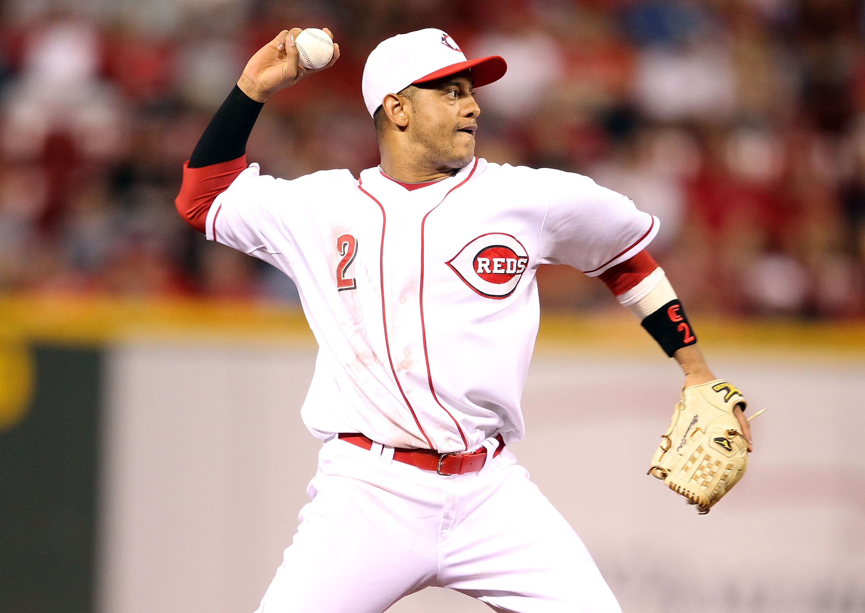 CINCINNATI - SEPTEMBER 11:  Orlando Cabrera #2 of the Cincinnati Reds throws to first base during the game against the Pittsburg Pirates at Great American Ball Park on September 11, 2010 in Cincinnati, Ohio.  (Photo by Andy Lyons/Getty Images)