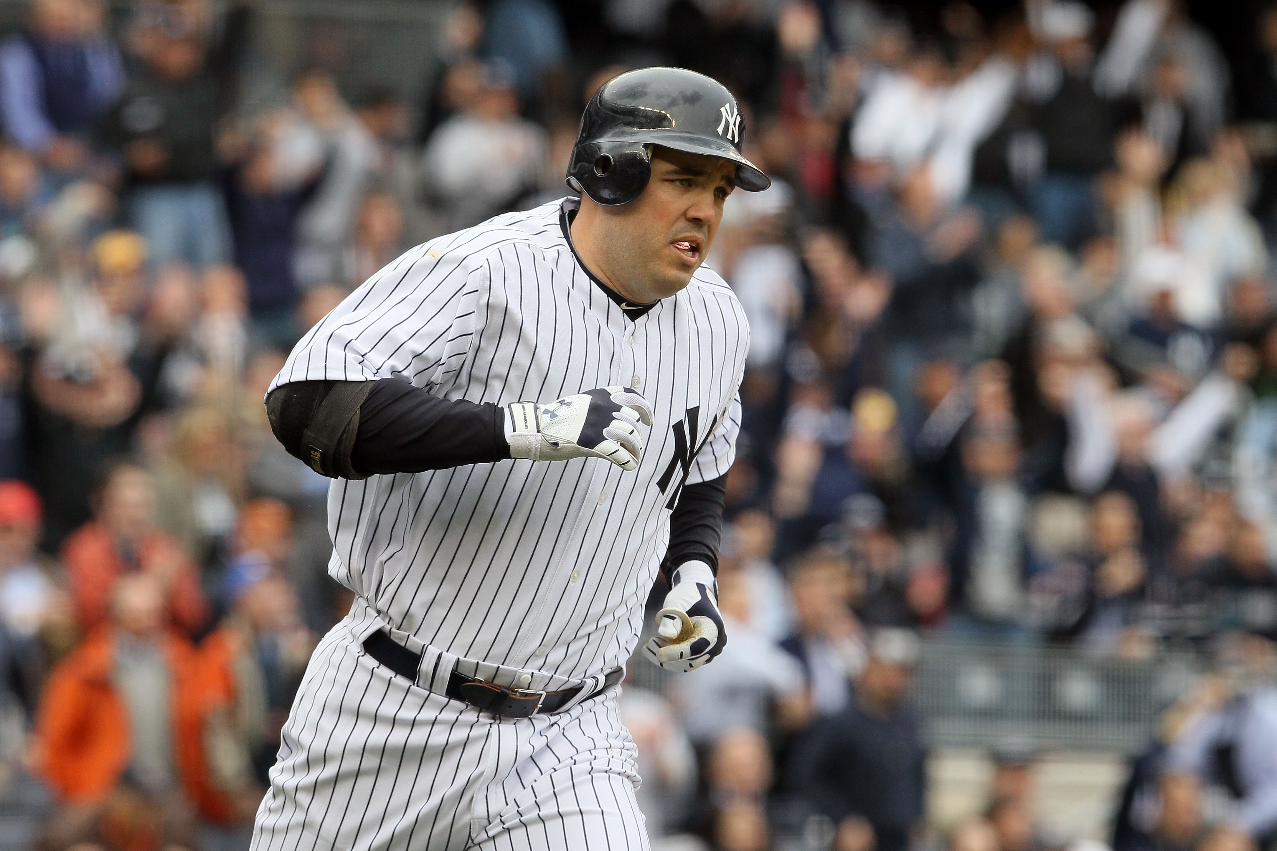 NEW YORK - APRIL 13:  Nick Johnson #26 of the New York Yankees runs the bases on a solo home run in the bottom of the firts inning against the Los Angeles Angels of Anaheim during the Yankees home opener at Yankee Stadium on April 13, 2010 in the Bronx bo