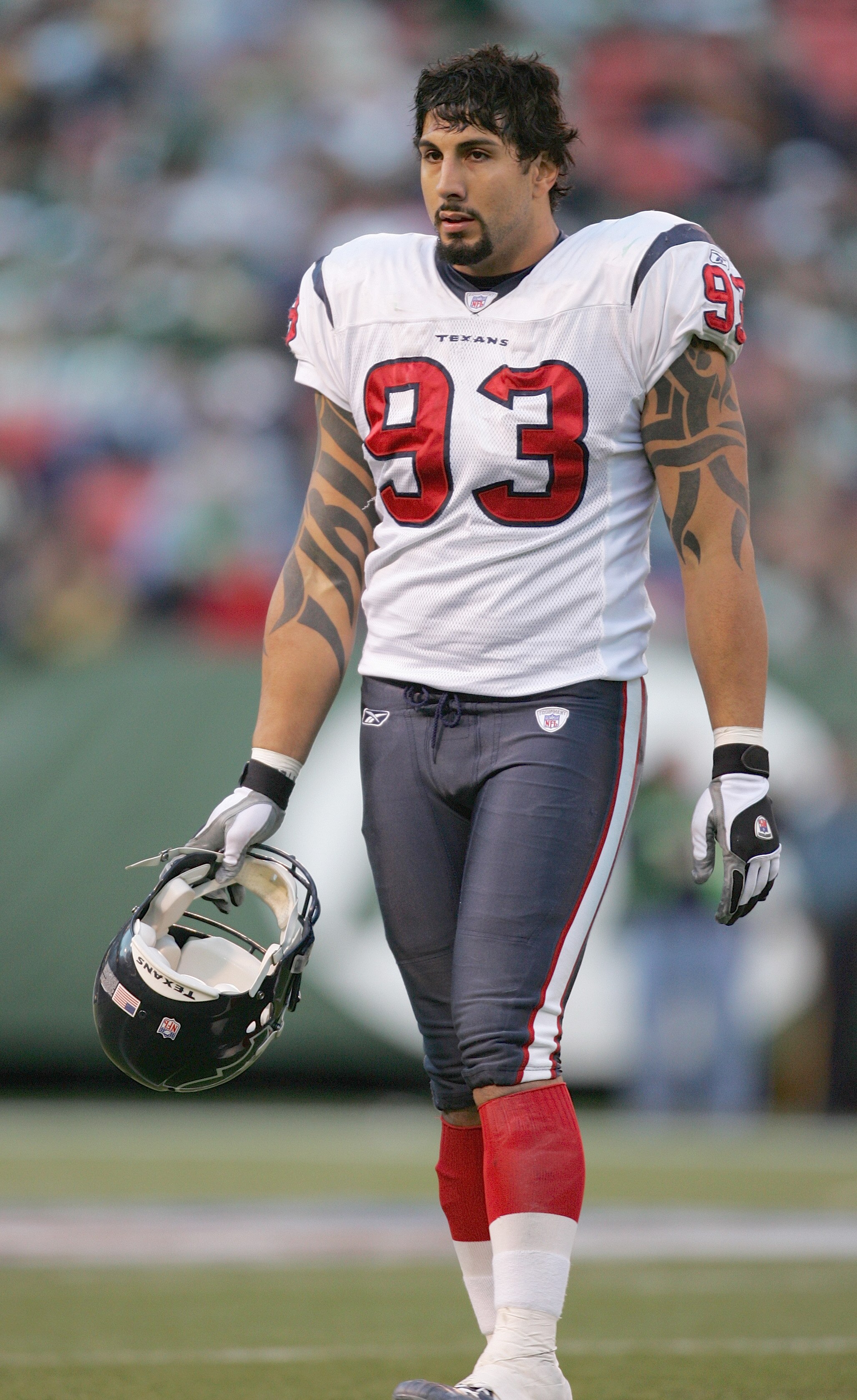 EAST RUTHERFORD, NJ - DECEMBER 5:  Jason Babin #93 of the Houston Texans stands on the field during the game against the New York Jets at Giants Stadium on December 5, 2004 in East Rutherford, New Jersey. The Jets won 29-7. (Photo by Chris Trotman/Getty I