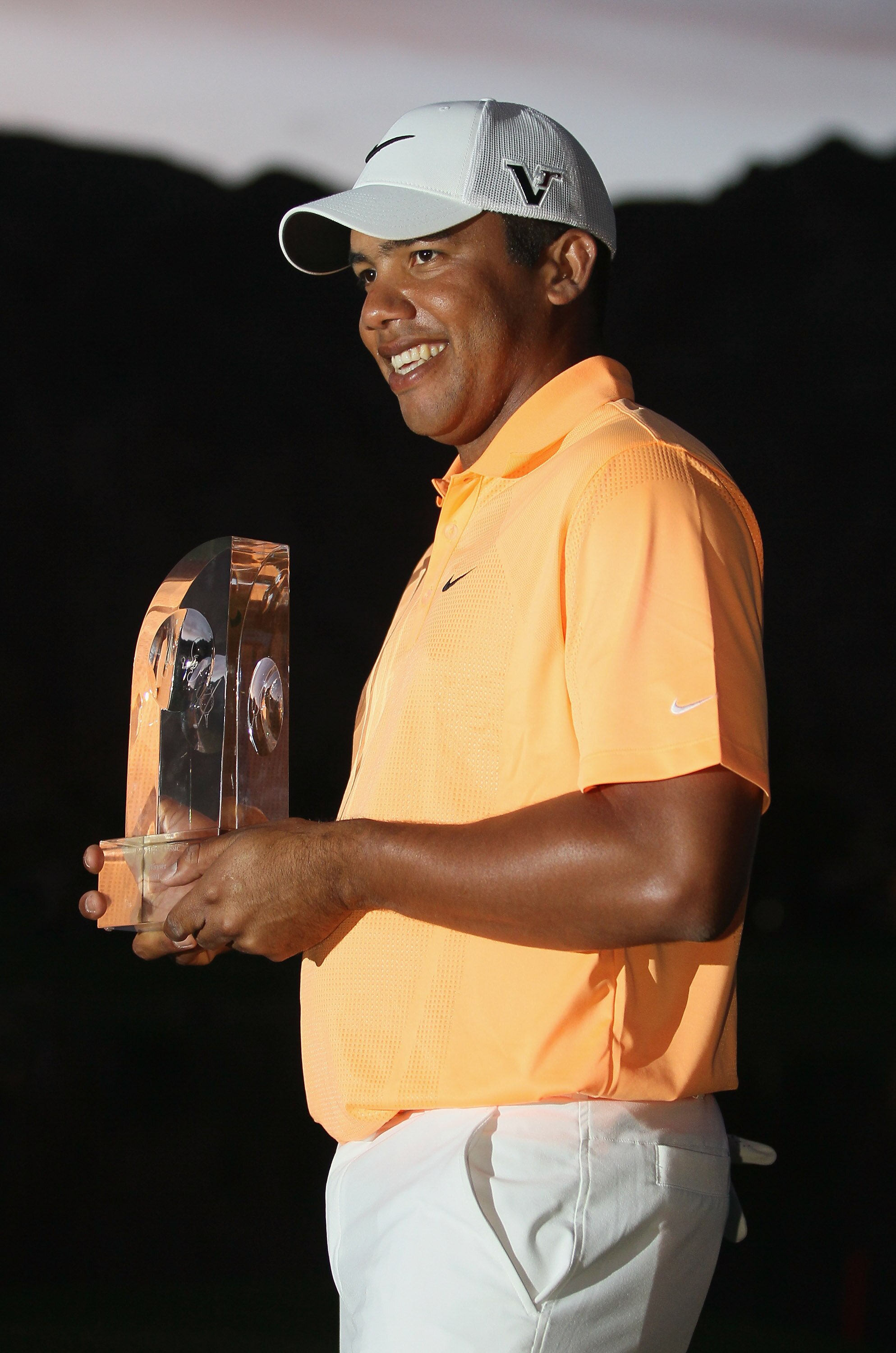 LA QUINTA, CA - JANUARY 23:  Jhonattan Vegas of Venezuela poses with the trophy after winning the Bob Hope Classic at the Palmer Private course at PGA West on January 23, 2011 in La Quinta, California.  (Photo by Jeff Gross/Getty Images)