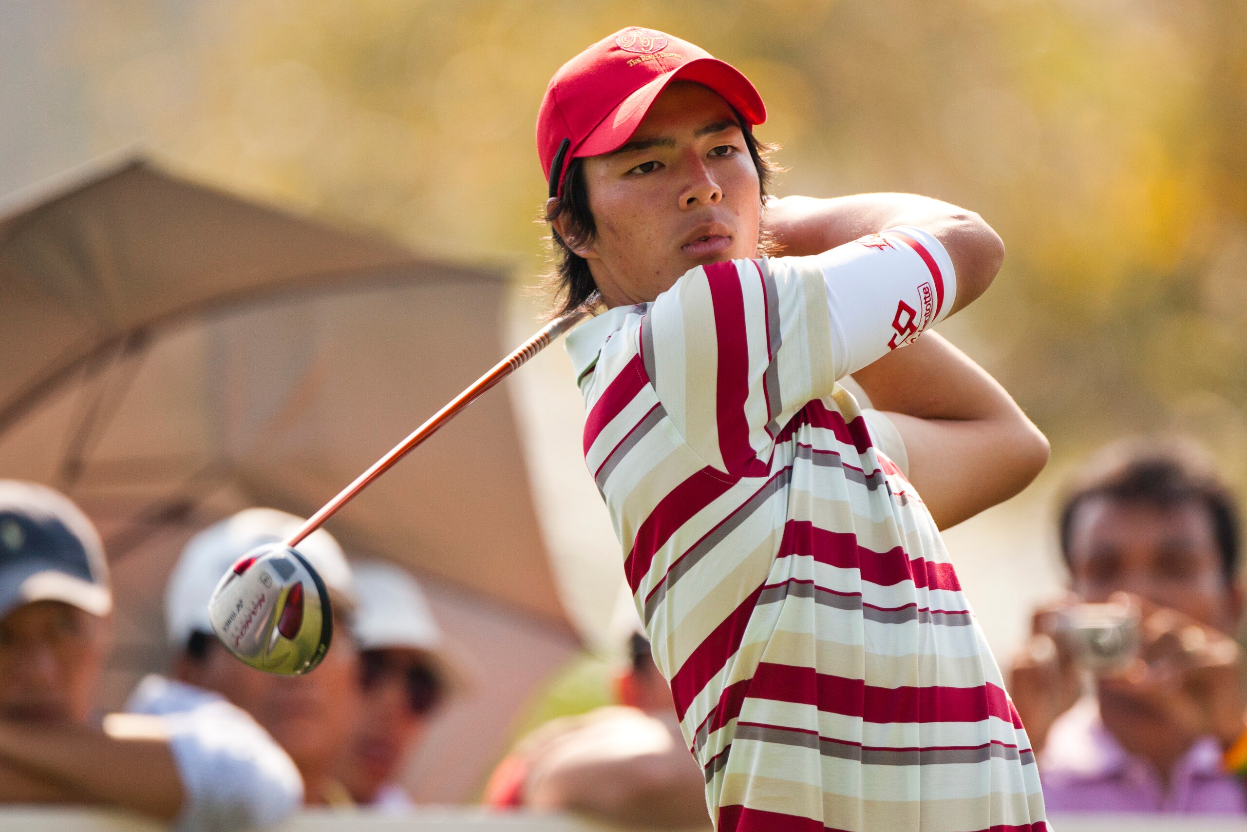 HUA HIN, THAILAND - JANUARY 08: Ryo Ishikawa of Japan tees off on the 12th hole during day two of The Royal Trophy tournament at Black Mountain Golf Club on January 8, 2011 in Hua Hin, Thailand. (Photo by Athit Perawongmetha/Getty Images) HUA HIN, THAILAND - JANUARY 08: Ryo Ishikawa of Japan tees off on the 12th hole during day two of The Royal Trophy tournament at Black Mountain Golf Club on January 8, 2011 in Hua Hin, Thailand. (Photo by Athit Perawongmetha/Getty Images)