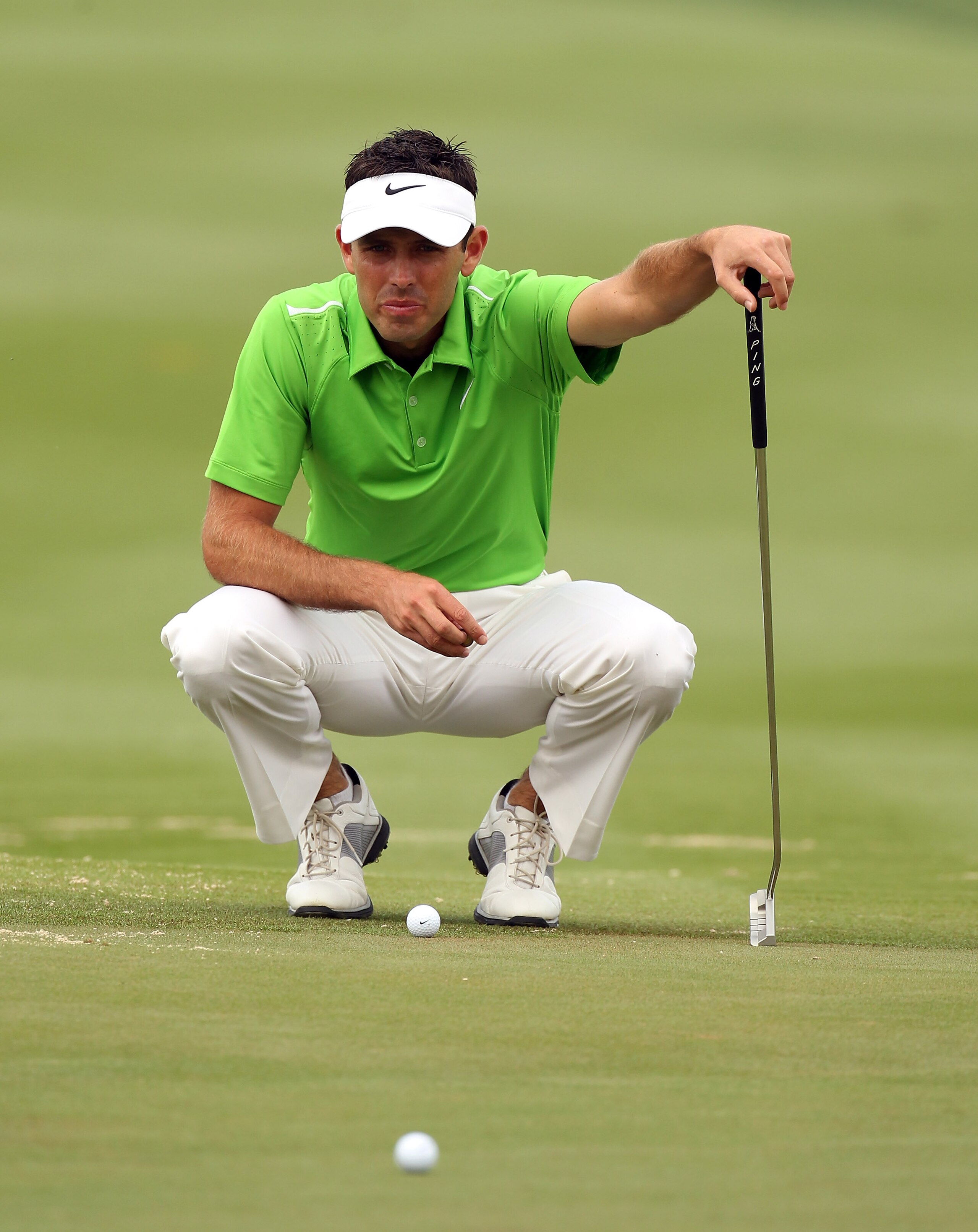 ABU DHABI, UNITED ARAB EMIRATES - JANUARY 22: Charl Schwartzel of South Africa checks the line of his putt during the third round of the Abu Dhabi HSBC Golf Championship at the Abu Dhabi Golf Club on January 22, 2011 in Abu Dhabi, United Arab Emirates. ABU DHABI, UNITED ARAB EMIRATES - JANUARY 22: Charl Schwartzel of South Africa checks the line of his putt during the third round of the Abu Dhabi HSBC Golf Championship at the Abu Dhabi Golf Club on January 22, 2011 in Abu Dhabi, United Arab Emirates.