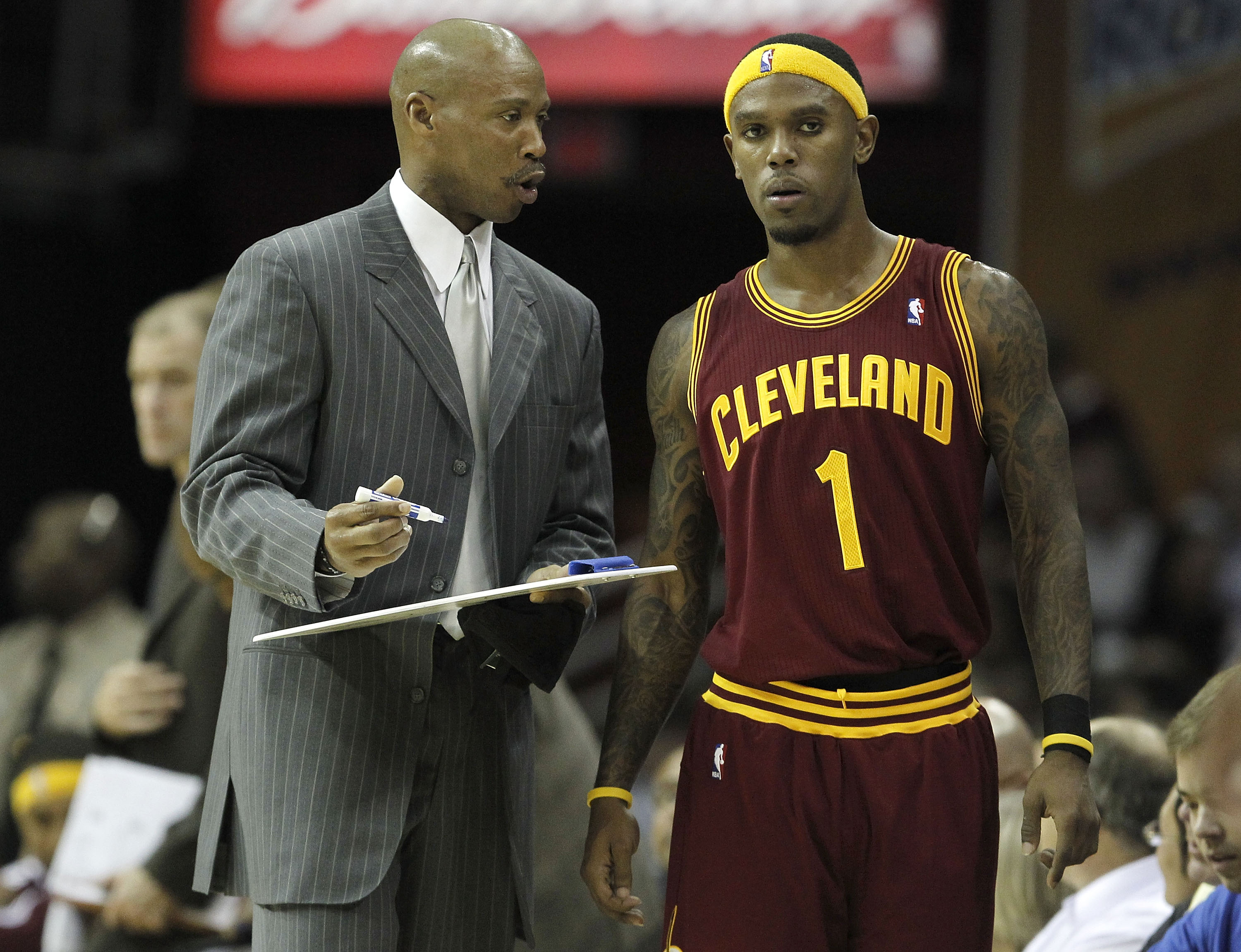 CLEVELAND - OCTOBER 27:  Head coach Byron Scott of the Cleveland Cavaliers talks over a play with Daniel Gibson #1 while playing the Boston Celtics at Quicken Loans Arena on October 27, 2010 in Cleveland, Ohio. Cleveland won the game 95-87. (Photo by Greg