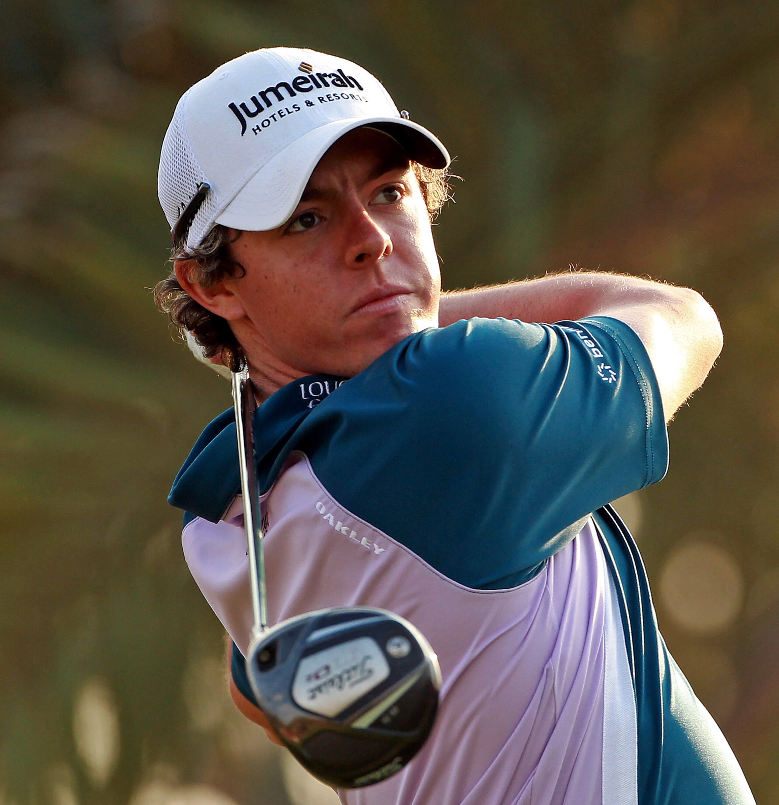 ABU DHABI, UNITED ARAB EMIRATES - JANUARY 23: Rory McIlroy of Northern Ireland in action during the final round of The Abu Dhabi HSBC Golf Championship at Abu Dhabi Golf Club on January 23, 2011 in Abu Dhabi, United Arab Emirates. (Photo by Andrew Redin ABU DHABI, UNITED ARAB EMIRATES - JANUARY 23: Rory McIlroy of Northern Ireland in action during the final round of The Abu Dhabi HSBC Golf Championship at Abu Dhabi Golf Club on January 23, 2011 in Abu Dhabi, United Arab Emirates. (Photo by Andrew Redin