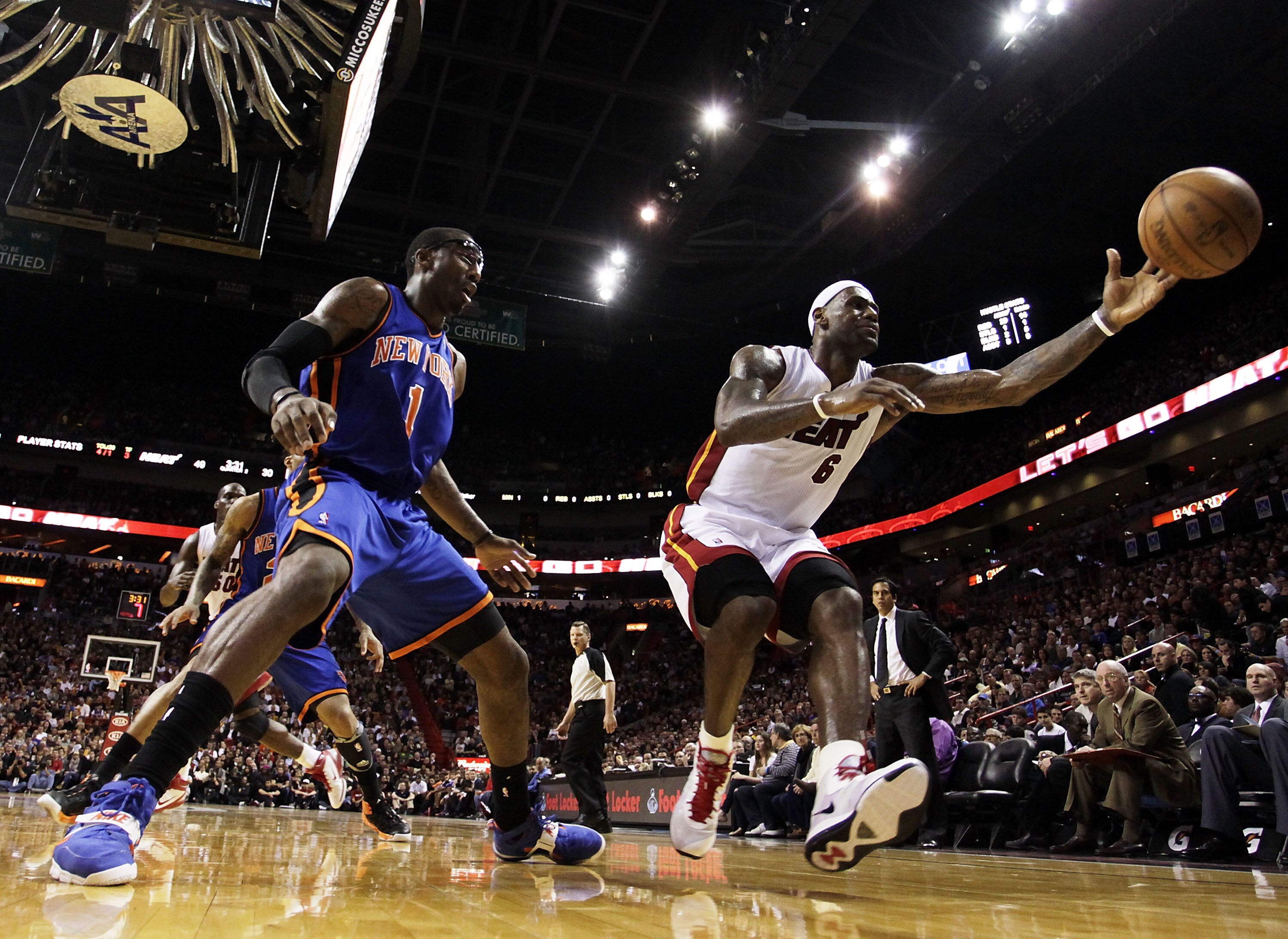 MIAMI - DECEMBER 28:  Forward LeBron James #6 of the Miami Heat and Forward Amar'e Stoudemire #1 of the New York Knicks battle for the ball at American Airlines Arena on December 28, 2010 in Miami, Florida.  (Photo by Marc Serota/Getty Images)
