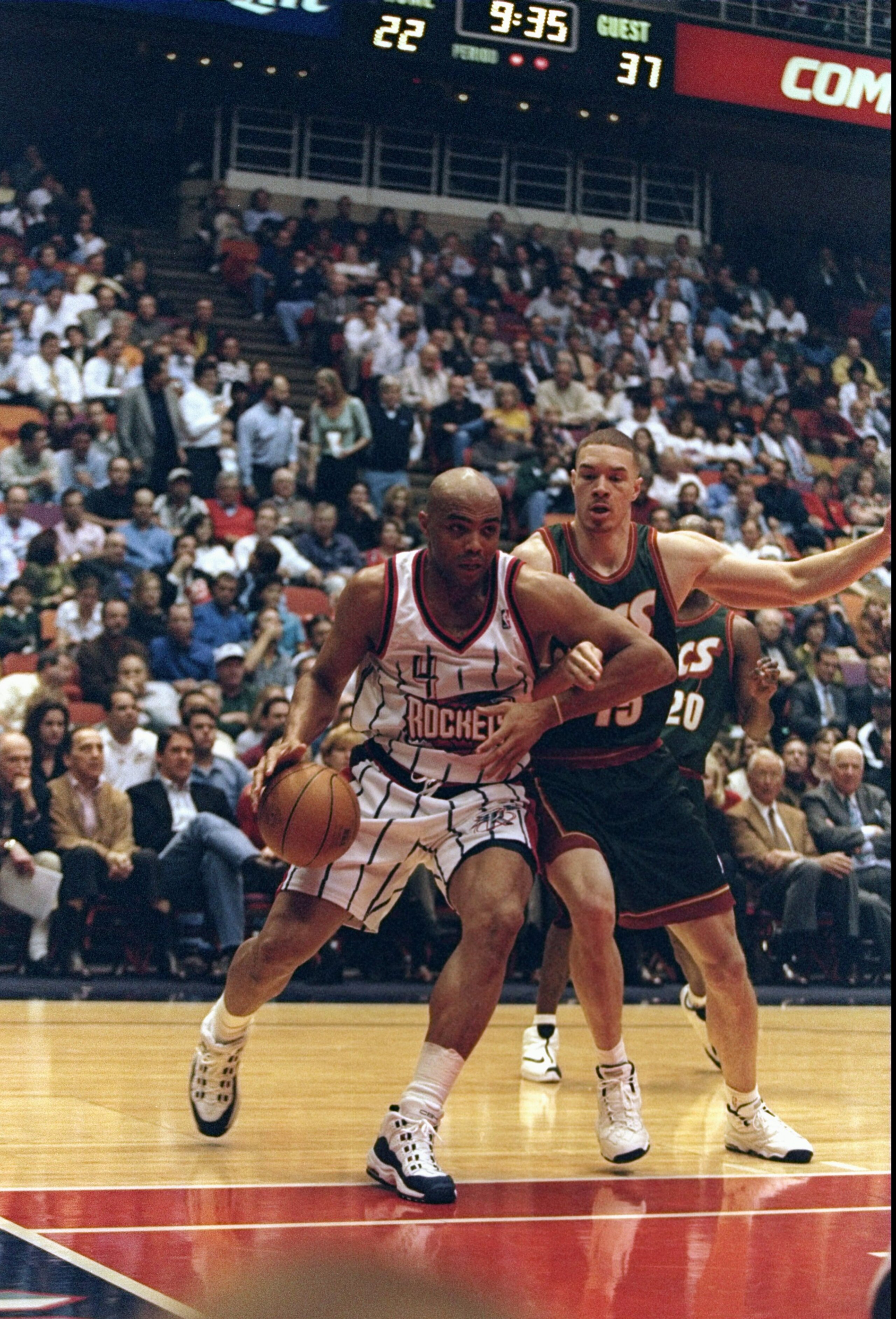 10 Feb 1998:  Forward Charles Barkley of the Houston Rockets and forward Aaron Williams of the Seattle SuperSonics fight for the ball during a game at The Summit in Houston, Texas.  The Rockets won the game, 97-83. Mandatory Credit: Robert Laberge  /Allsp