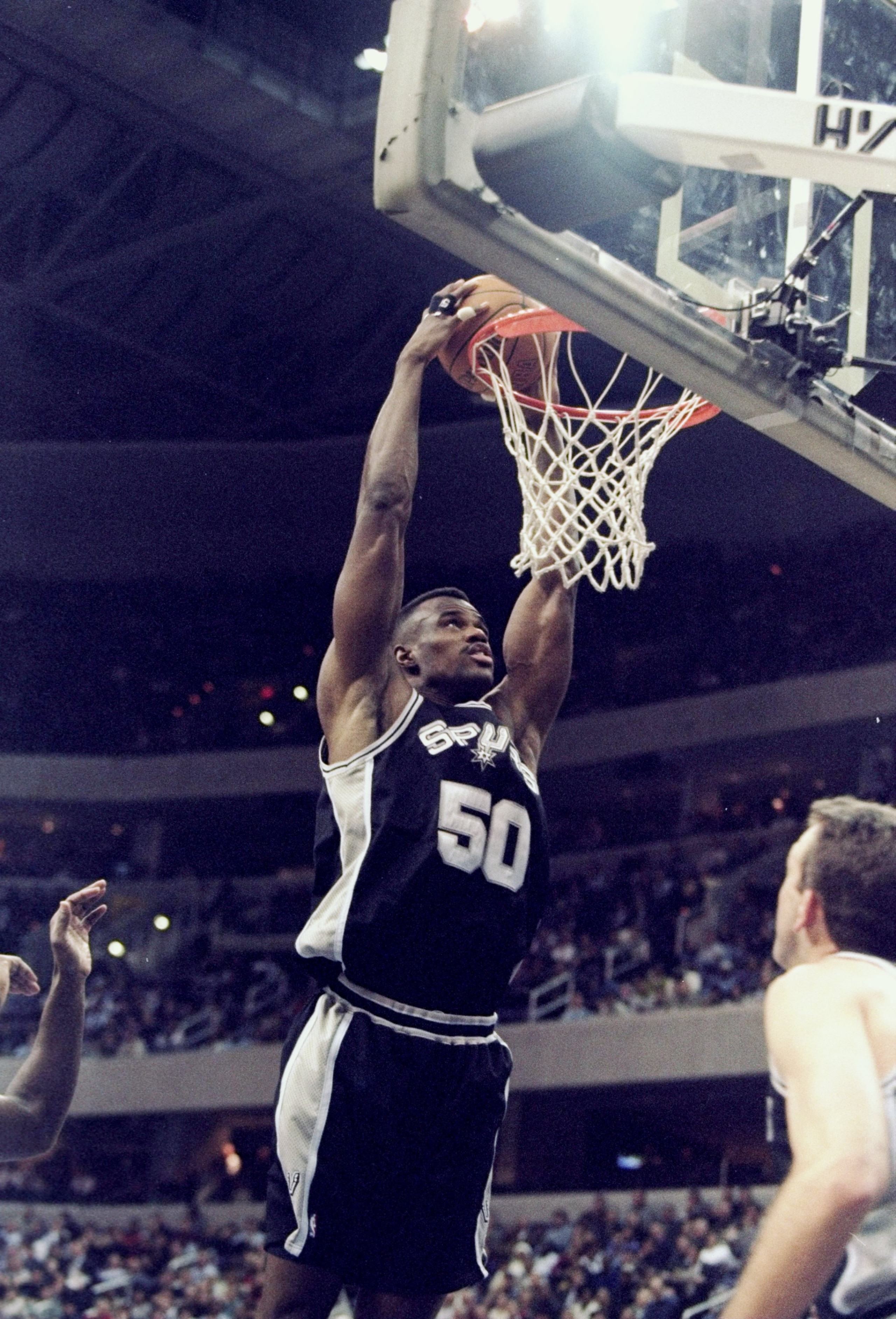 14 Jan 1998:  Center David Robinson of the San Antonio Spurs sinks the ball during a game against the Washington Wizards at the MCI Center in Washington, D. C.  The Spurs won the game, 89-73. Mandatory Credit: Jamie Squire  /Allsport