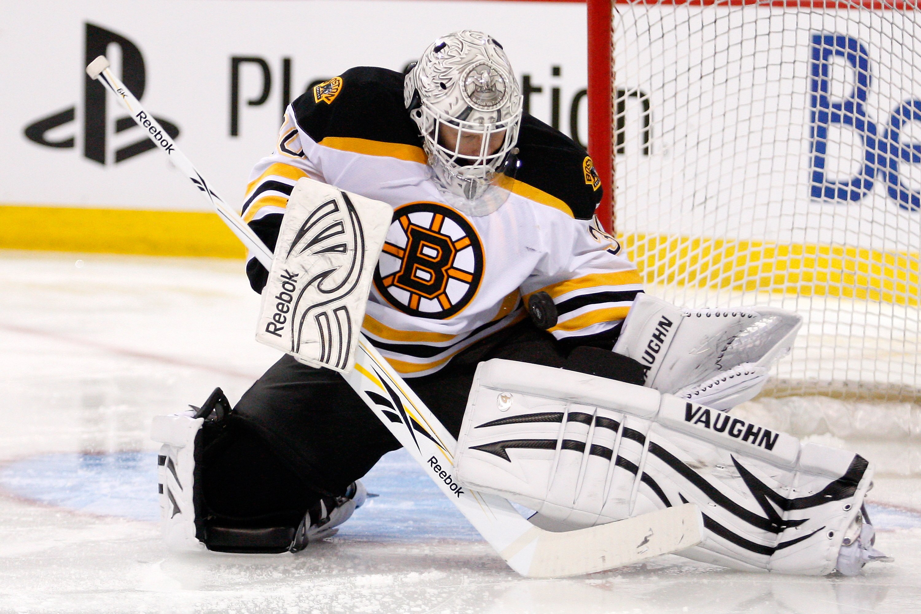 MONTREAL, CANADA - JANUARY 8:  Tim Thomas #30 of the Boston Bruins stops the puck during the NHL game against the Montreal Canadiens at the Bell Centre on January 8, 2011 in Montreal, Quebec, Canada.  (Photo by Richard Wolowicz/Getty Images)