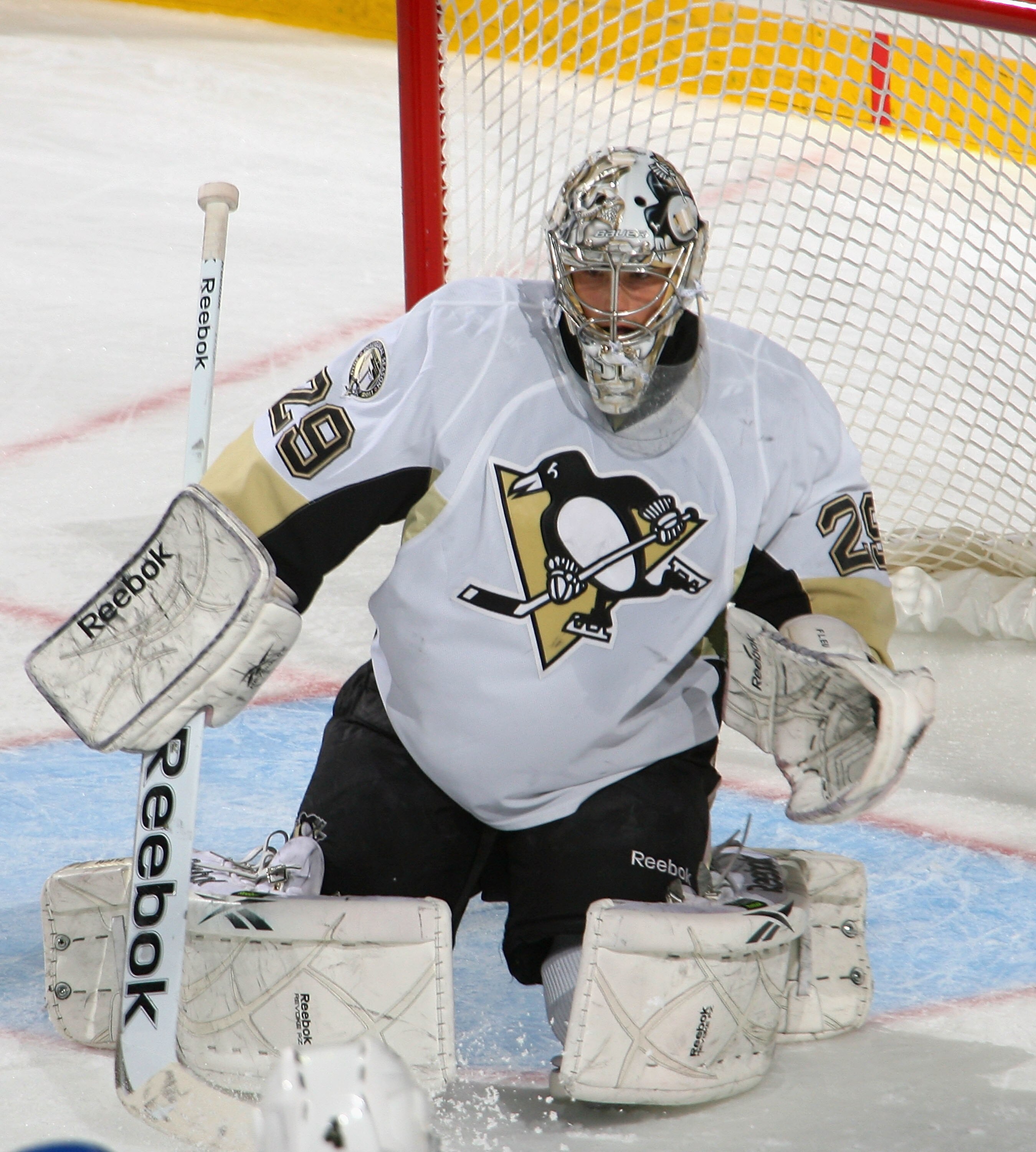 BUFFALO, NY - DECEMBER 11: Marc Andre Fleury #29 of the Pittsburgh Penguins defends against the Buffalo Sabres  at HSBC Arena on December 11, 2010 in Buffalo, New York. Pittsburgh won 5-2.  (Photo by Rick Stewart/Getty Images)