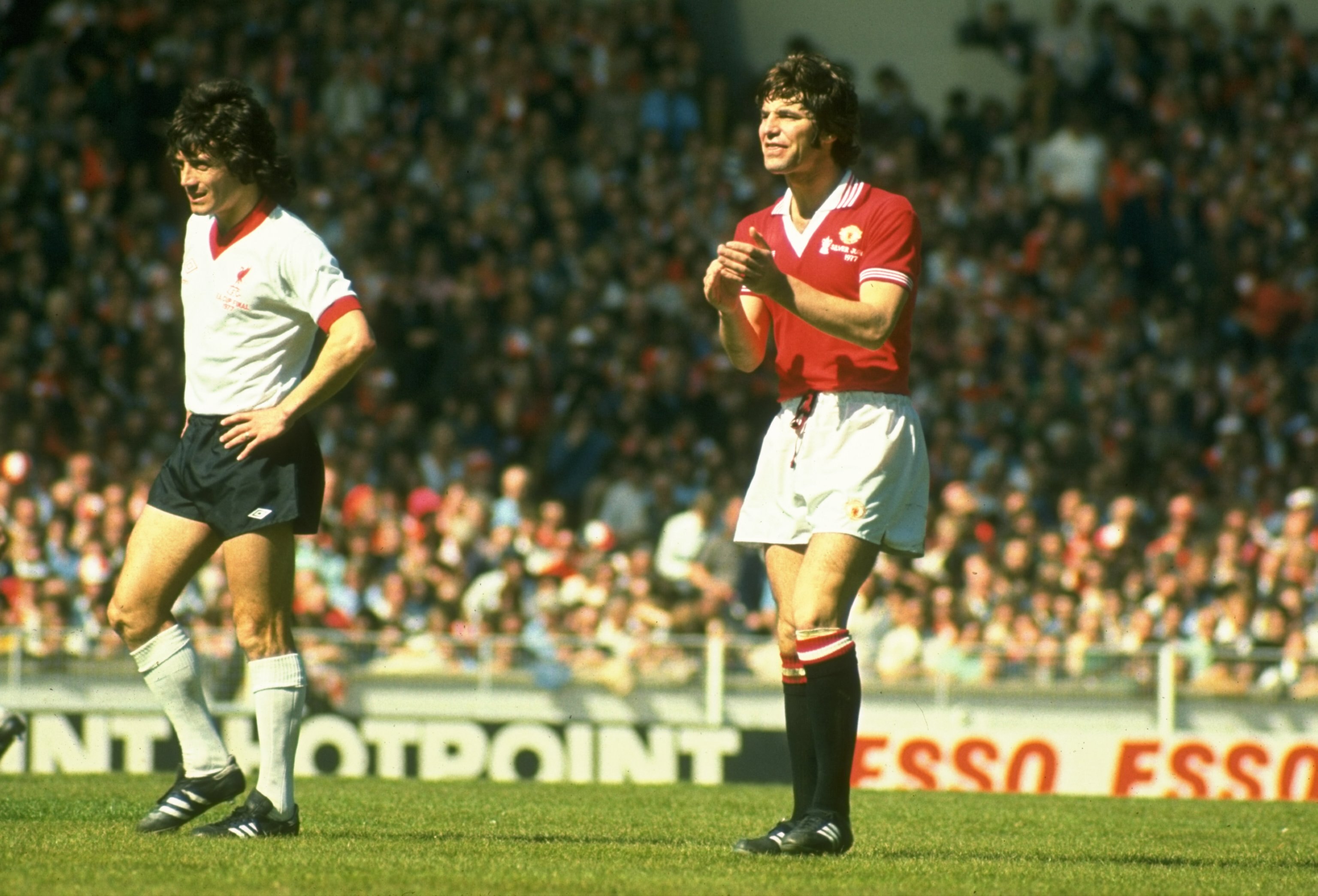 May 1977:  Martin Buchan (right) of Manchester United and Kevin Keegan (left) of Liverpool in action during the FA Cup final at Wembley Stadium in London. Manchester United won the match 2-0. \ Mandatory Credit: Allsport UK /Allsport