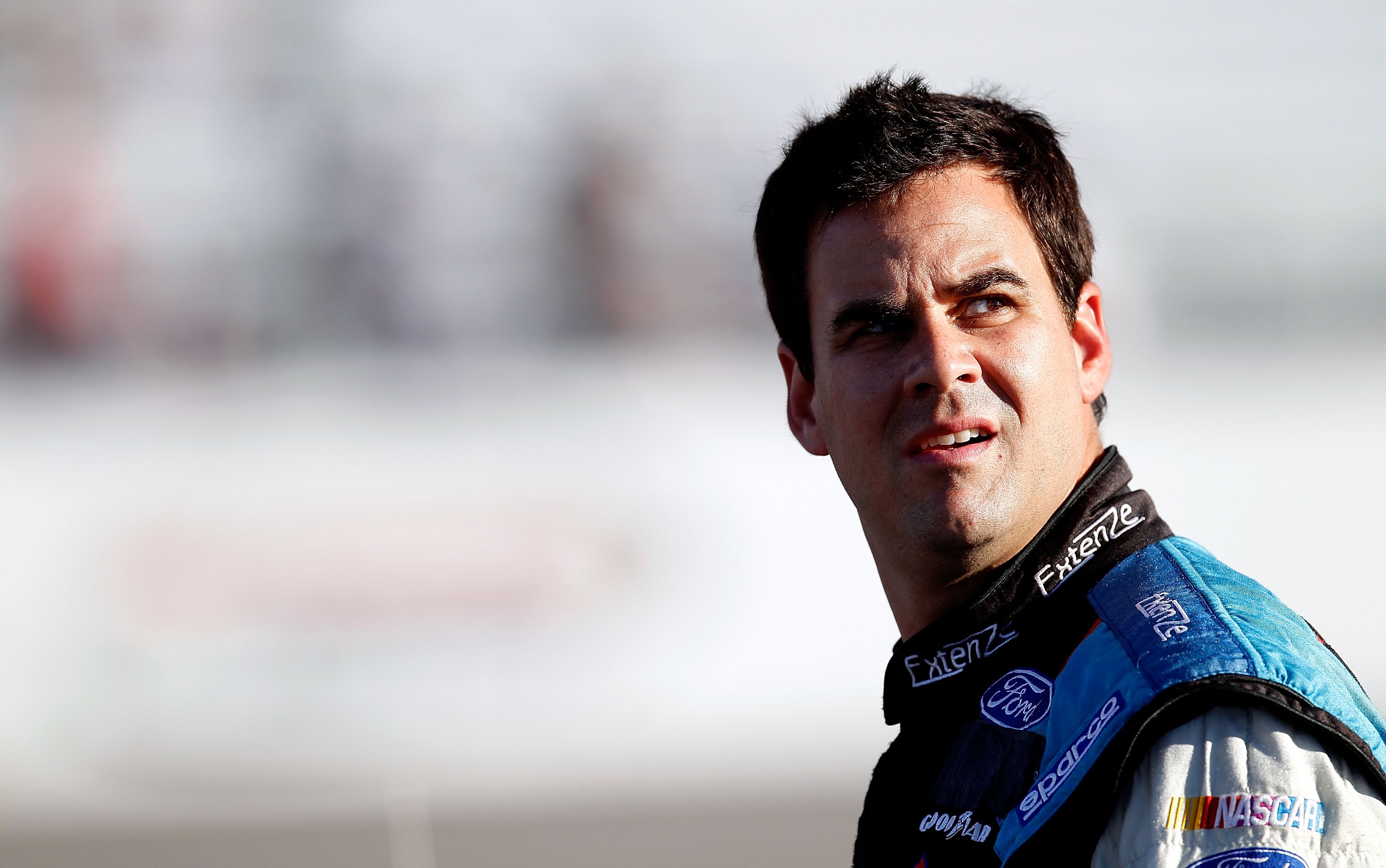 RICHMOND, VA - SEPTEMBER 10:  Kevin Conway, driver of the #7 Extenze Toyota, stands on the grid during qualifying for the NASCAR Sprint Cup Series Air Guard 400 at Richmond International Raceway on September 10, 2010 in Richmond, Virginia.  (Photo by Jeff