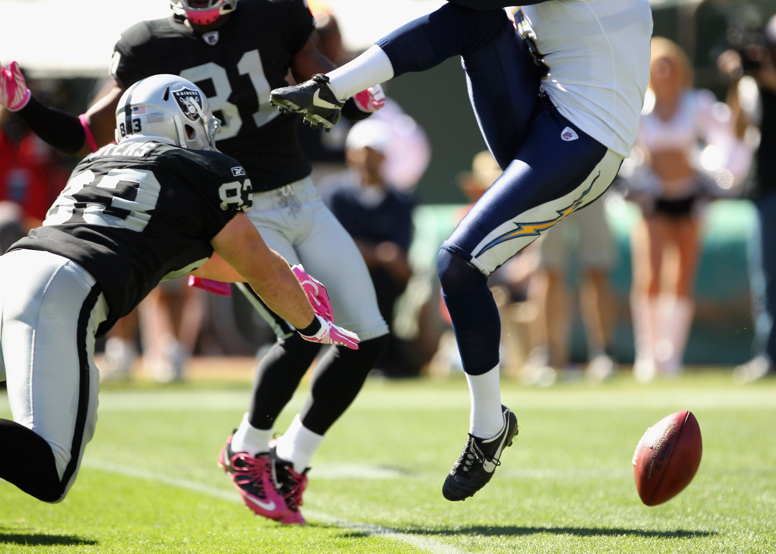 OAKLAND, CA - OCTOBER 10:  Brandon Myers #83 of the Oakland Raiders blocks a punt attempt by Mike Scifres #5 of the San Diego Chargers at Oakland-Alameda County Coliseum on October 10, 2010 in Oakland, California. This was the second blocked punt for the 