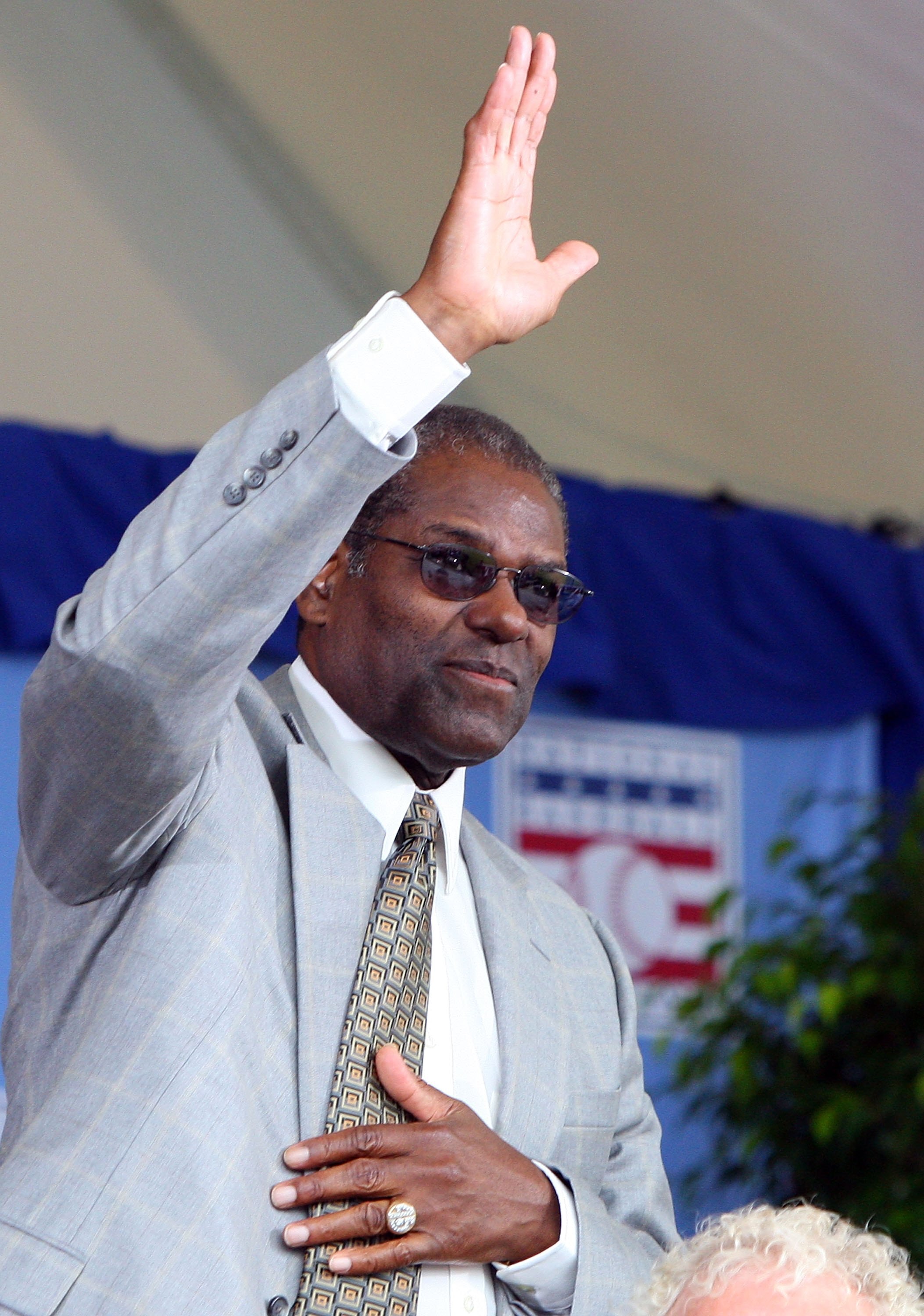COOPERSTOWN, NY - JULY 26:  Hall of Famer Bob Gibson waves to the crowd as he is introduced at Clark Sports Center during the 2009  Baseball Hall of Fame induction ceremony on July 26, 2009 in Cooperstown, New York.  (Photo by Jim McIsaac/Getty Images)