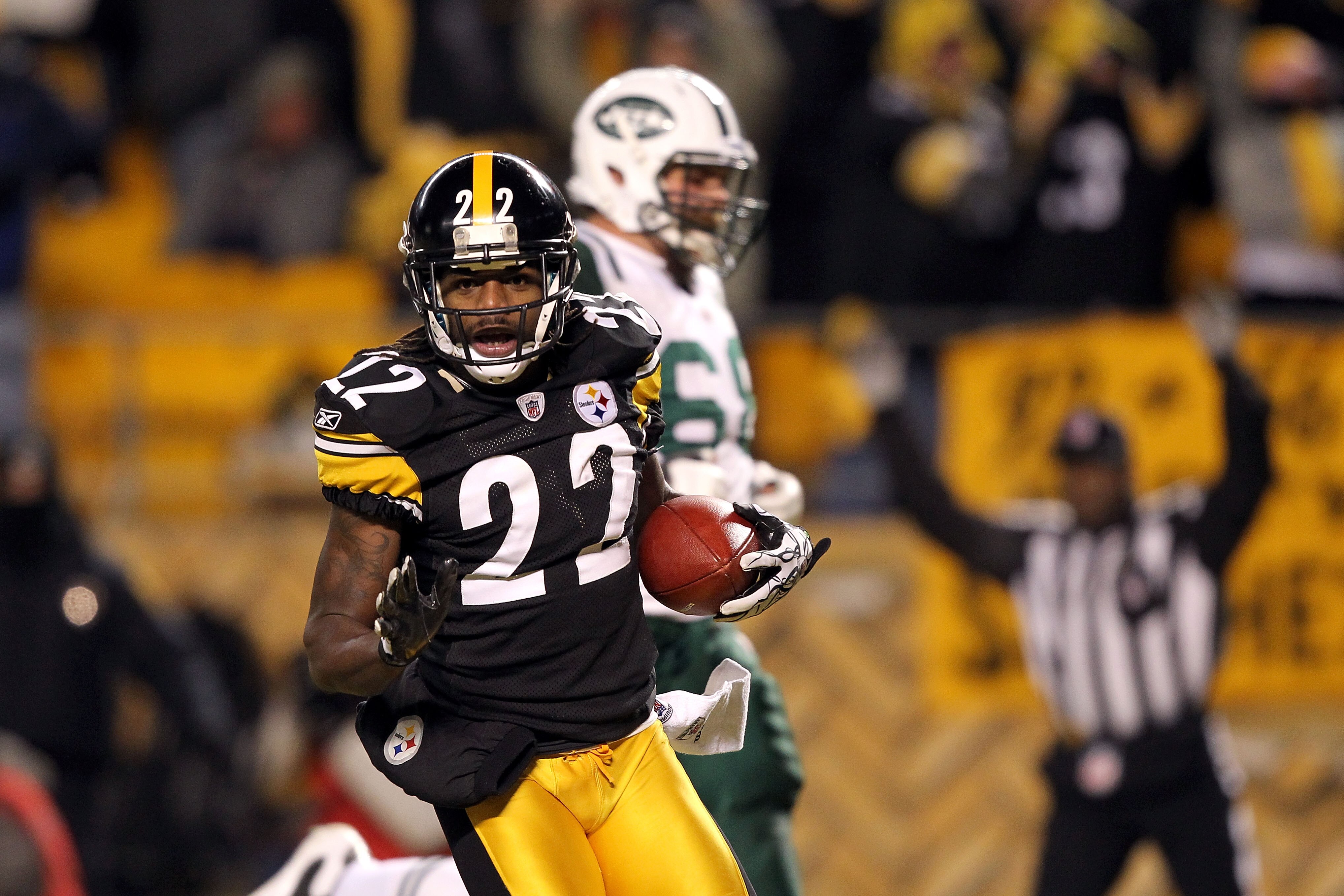 PITTSBURGH, PA - JANUARY 23:  William Gay #22 of the Pittsburgh Steelers runs for a second quarter touchdown on a fumble recovery against Mark Sanchez #6 (not pictured) of the New York Jets during the 2011 AFC Championship game at Heinz Field on January 2