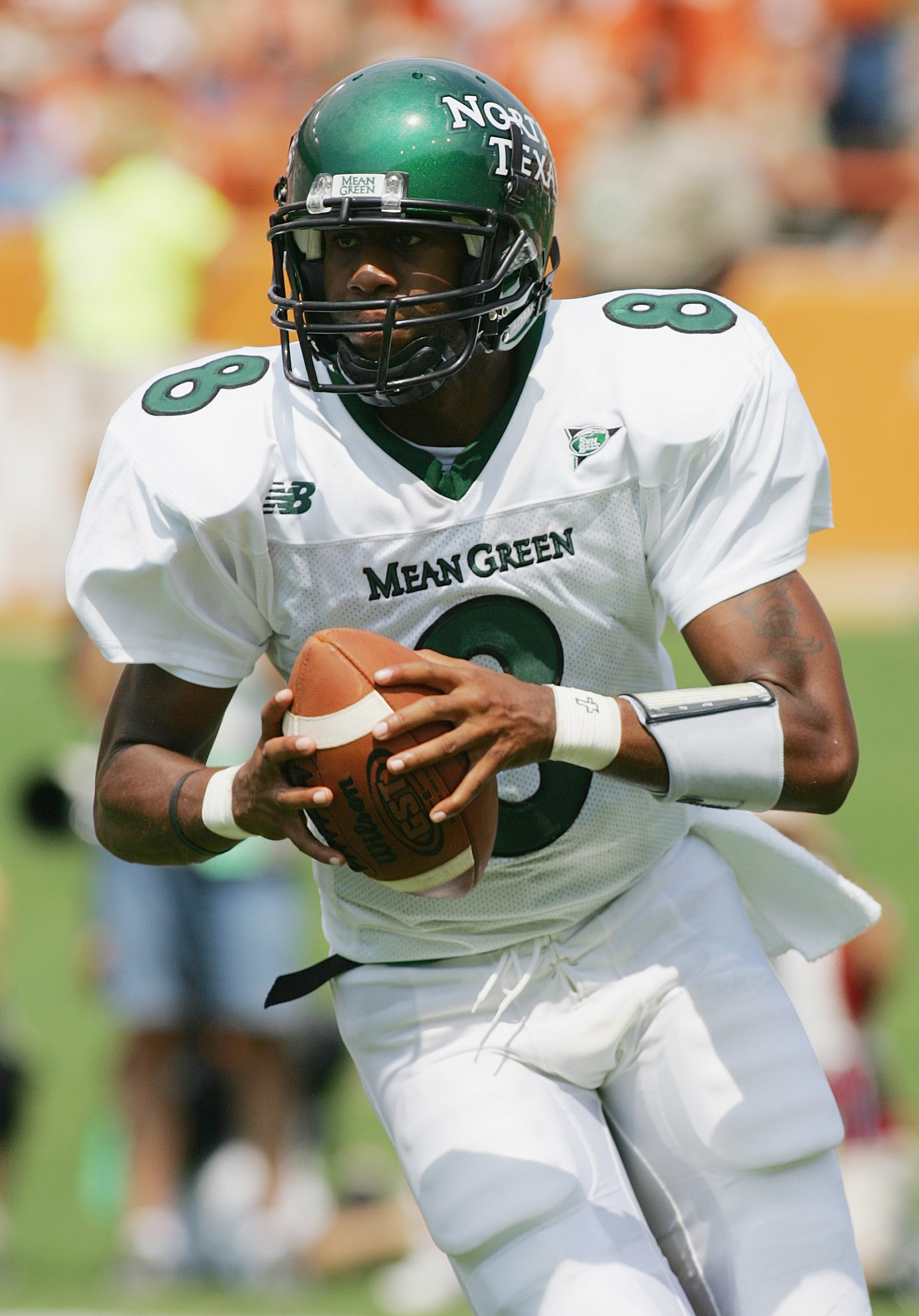 AUSTIN, TX - SEPTEMBER 2:  Quarterback Woody Wilson #8 of the North Texas Eagles looks to move the ball against the Texas Longhorns on September 2, 2006 at Texas Memorial Stadium in Austin, Texas. The Longhorns defeated the Eagles 56-7. (Photo by Ronald M