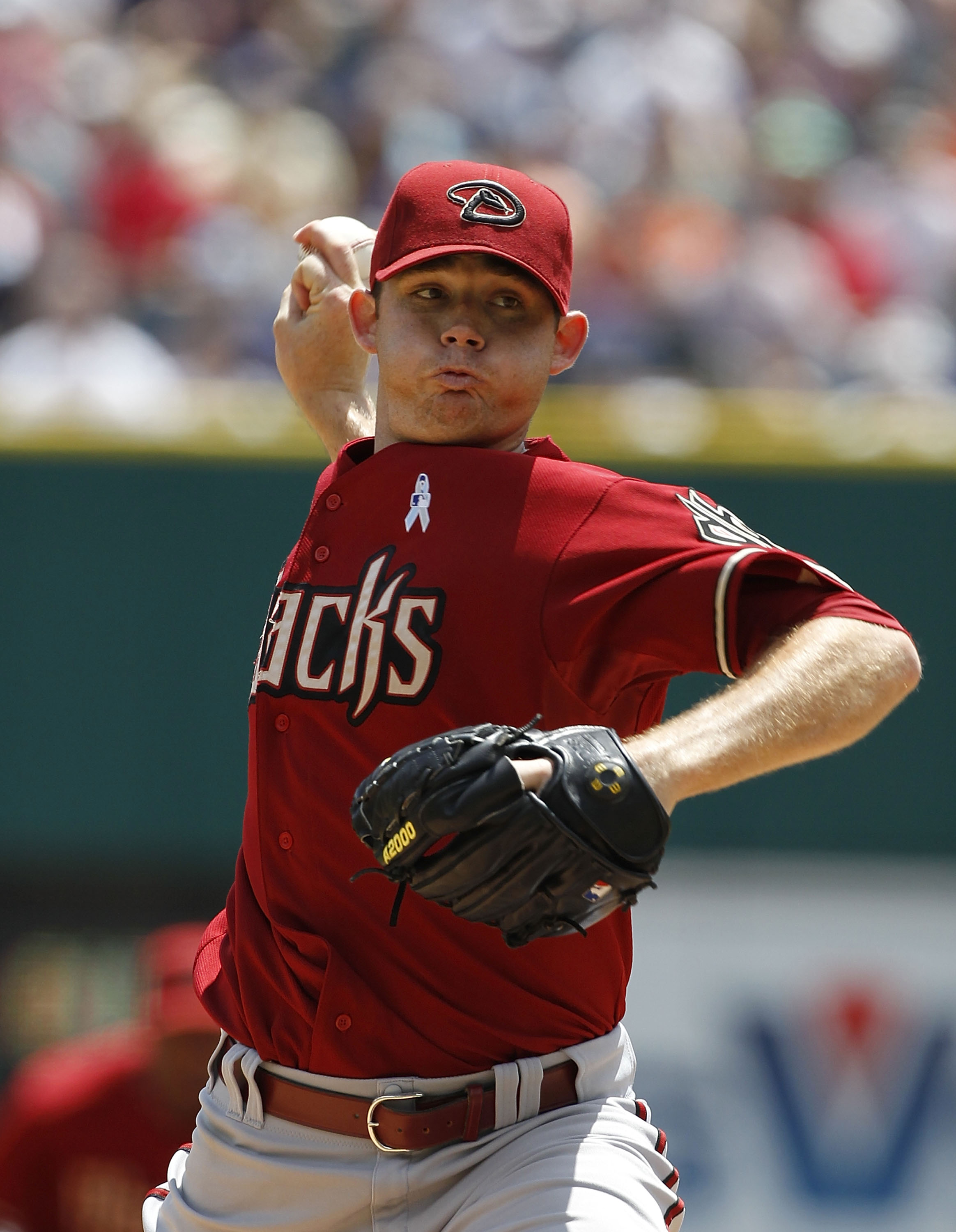 DETROIT - JUNE 20:  Ian Kennedy #31 of the Arizona Diamondbacks pitches in the second inning against the Detroit Tigers on June 20, 2010 at Comerica Park in Detroit, Michigan. The Tigers defeated the Diamondbacks 3-1.  (Photo by Leon Halip/Getty Images)